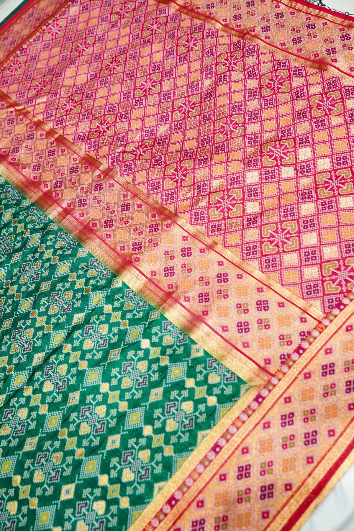 Bottle Green Ikkat Patola Silk Saree with Blush Pink Border