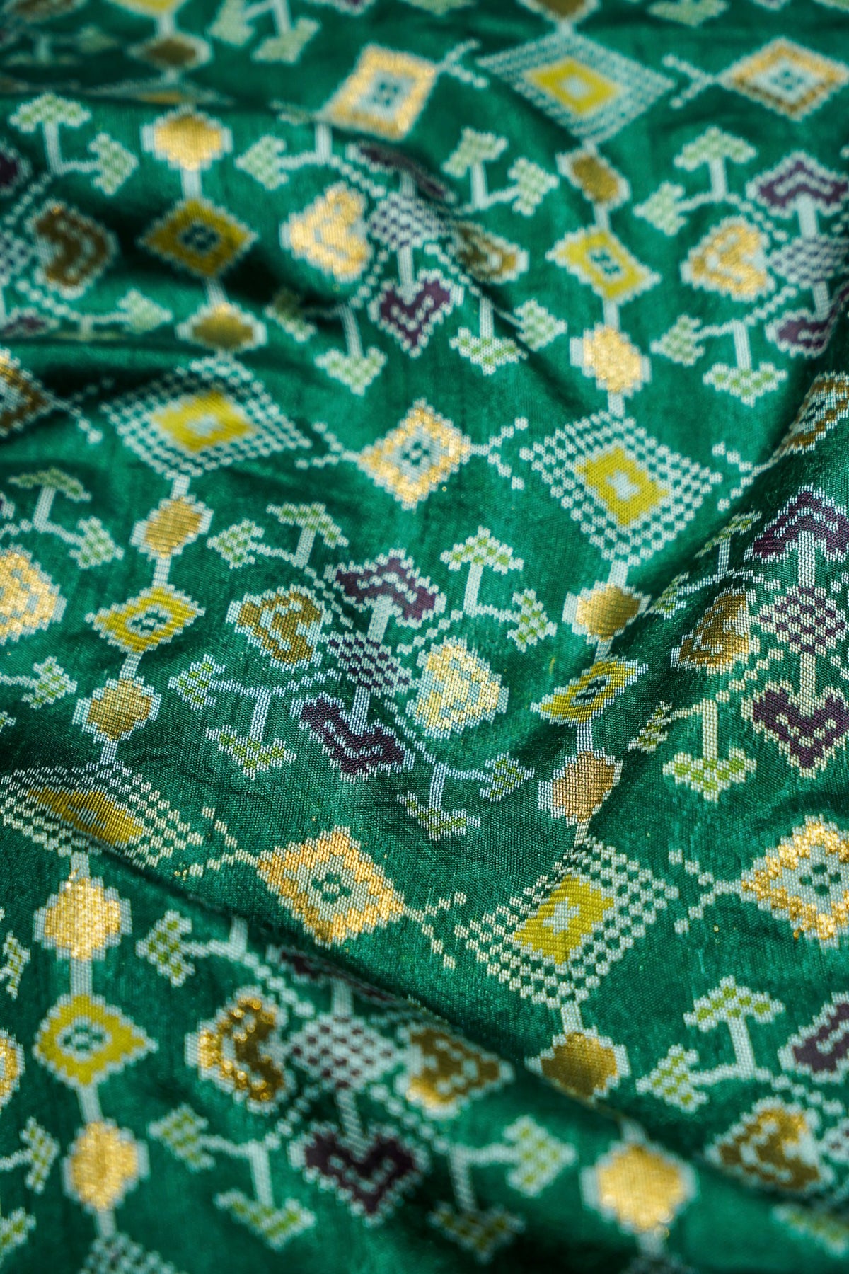 Bottle Green Ikkat Patola Silk Saree with Blush Pink Border