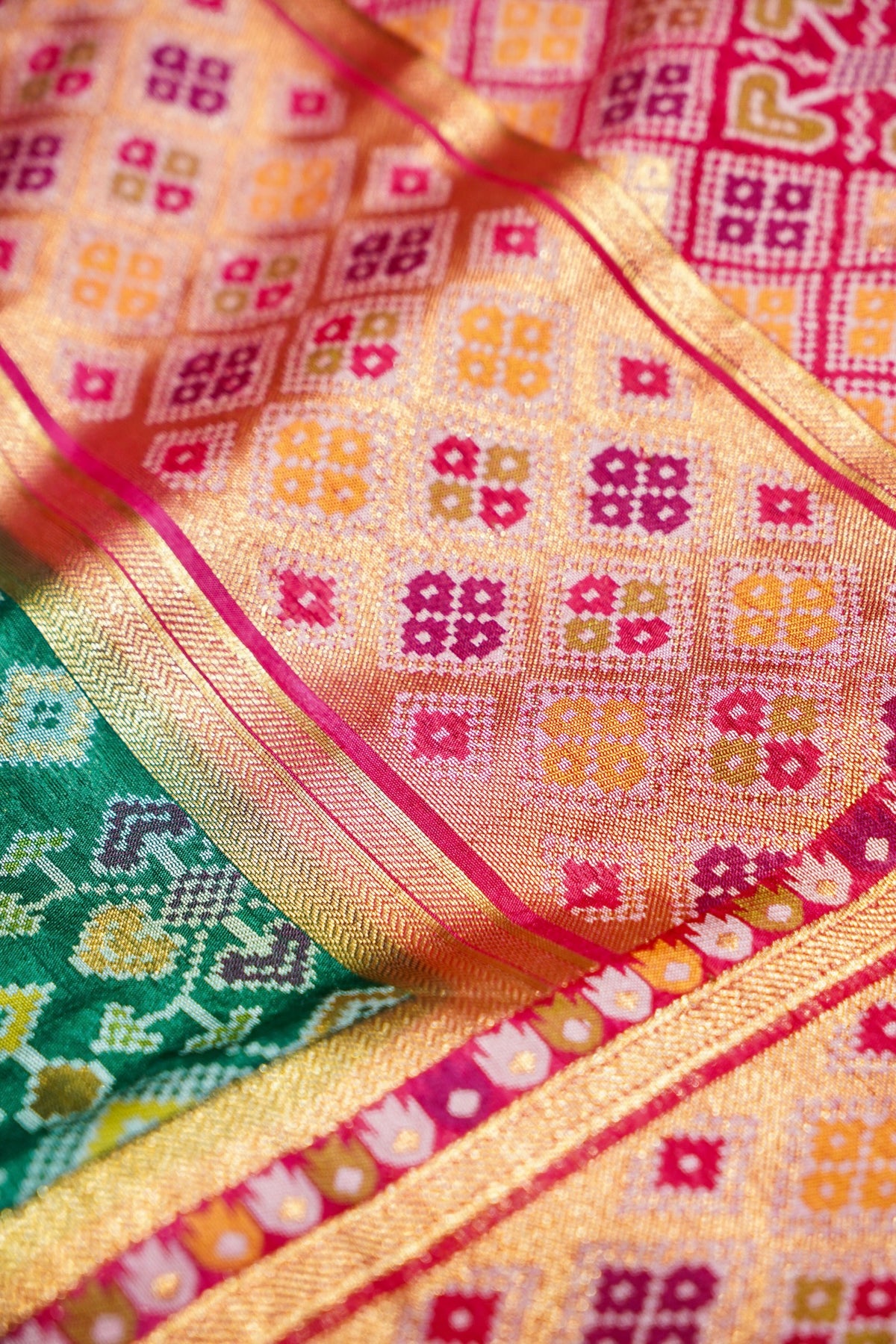 Bottle Green Ikkat Patola Silk Saree with Blush Pink Border