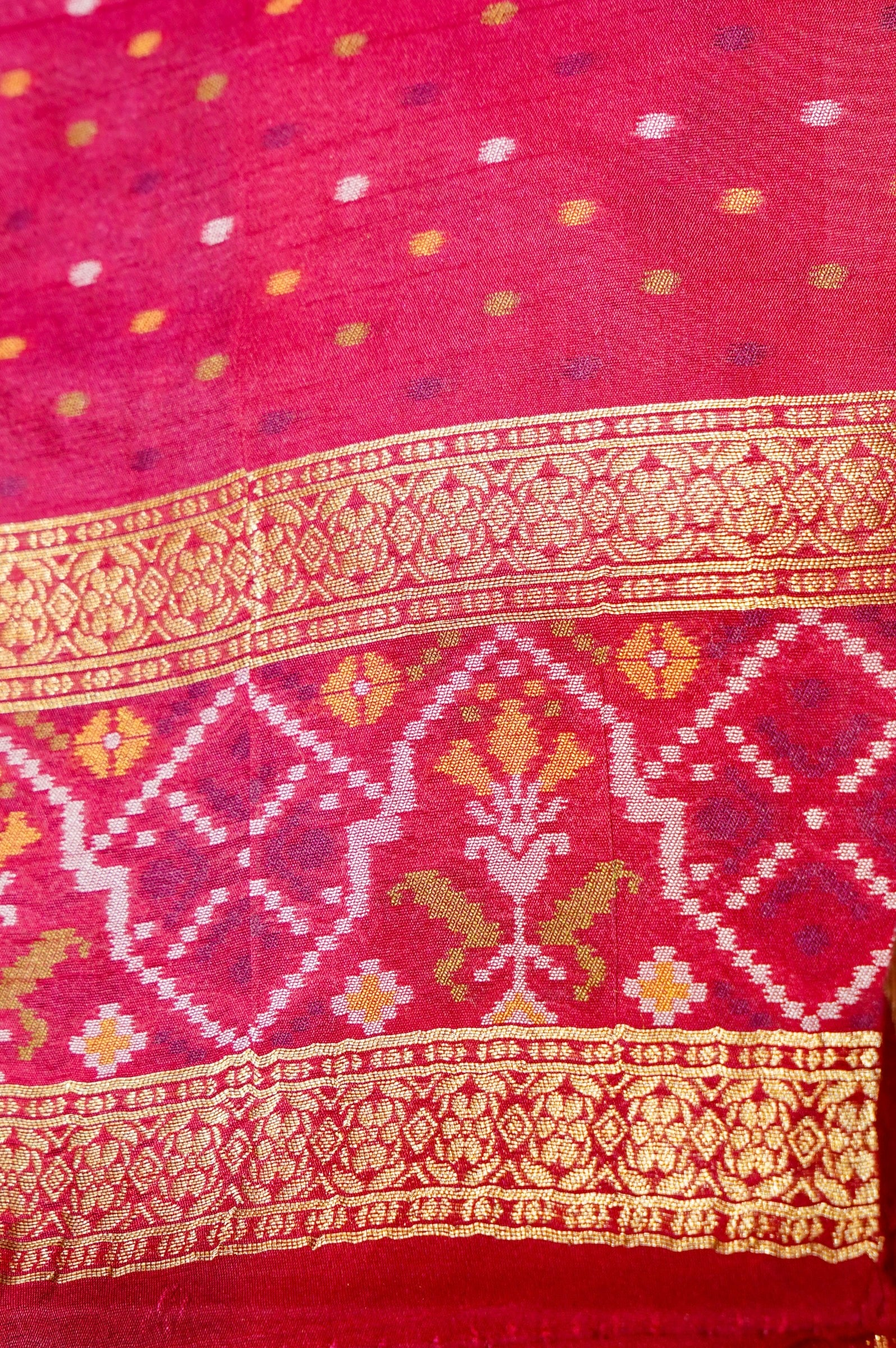 Aqua Blue Ikkat Patola Silk Saree with Rani Pink Border