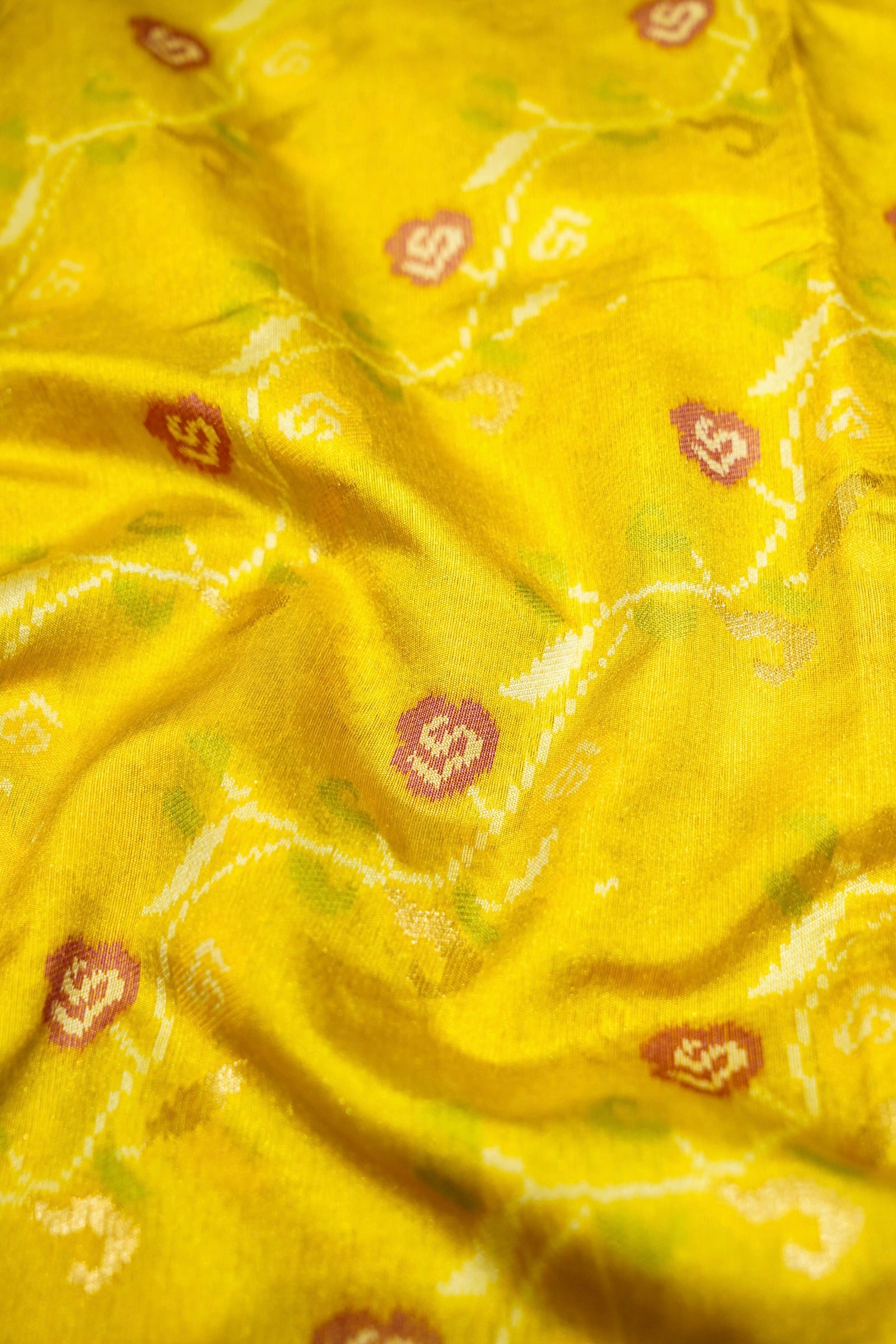 Sunshine Yellow Ikkat Patola Silk Saree with Violet Border