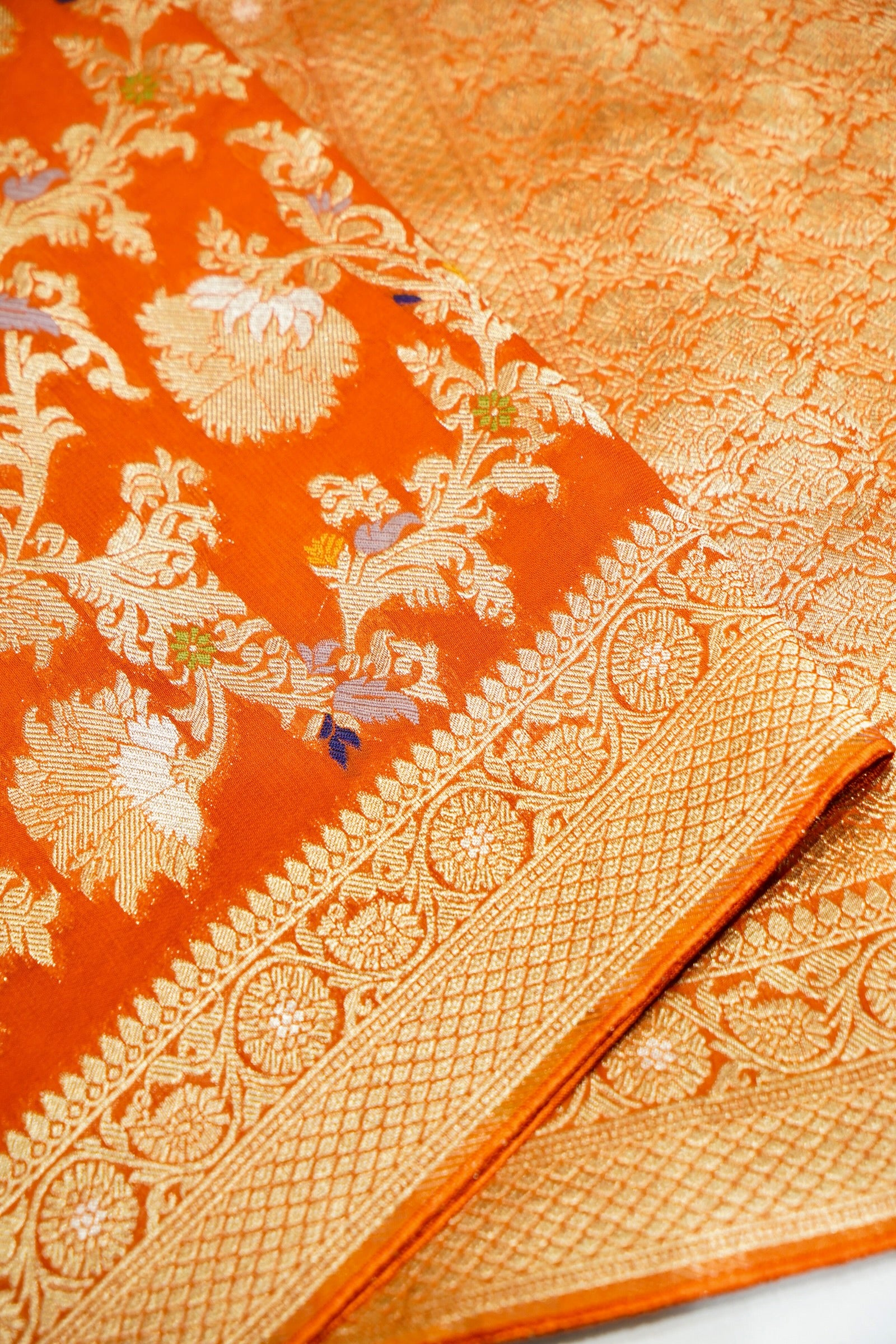 Tangerine Orange Semi Georgette Silk Saree with Gold Zari Border