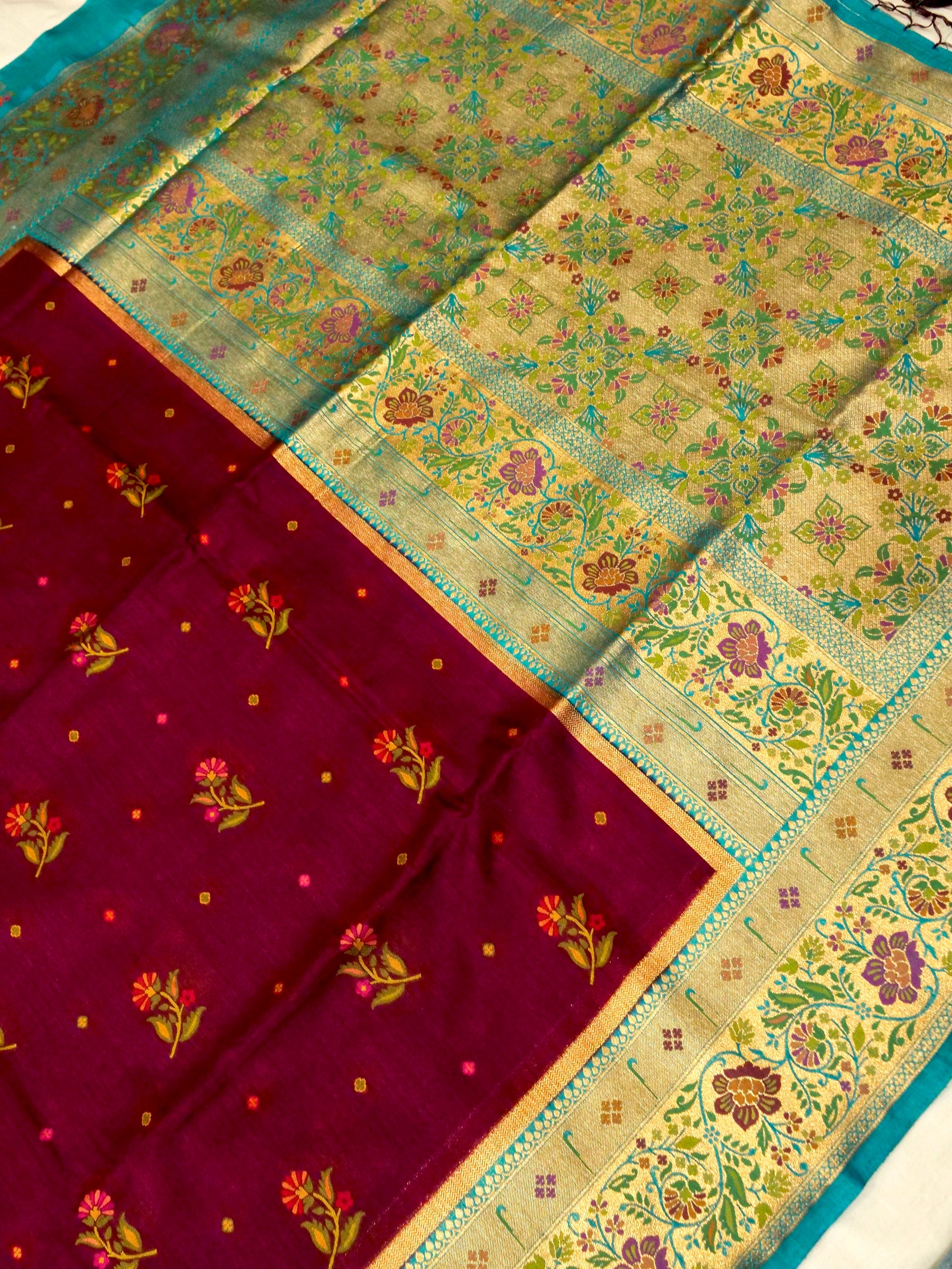 Wine Magenta Patola Silk Saree with Contrast Turquoise Border and Floral Weave