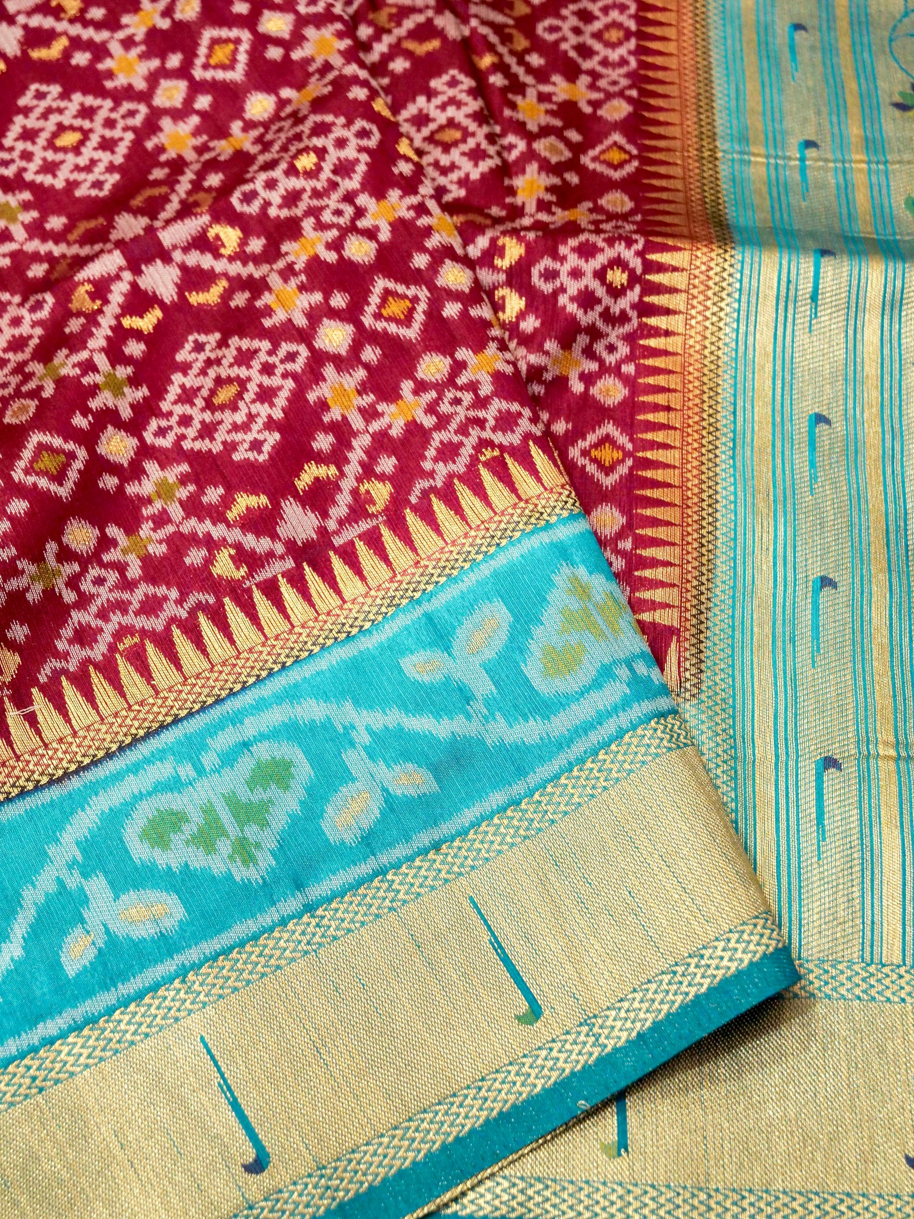 Maroon Wine Patola Silk Saree with Contrast Turquoise Blue Border