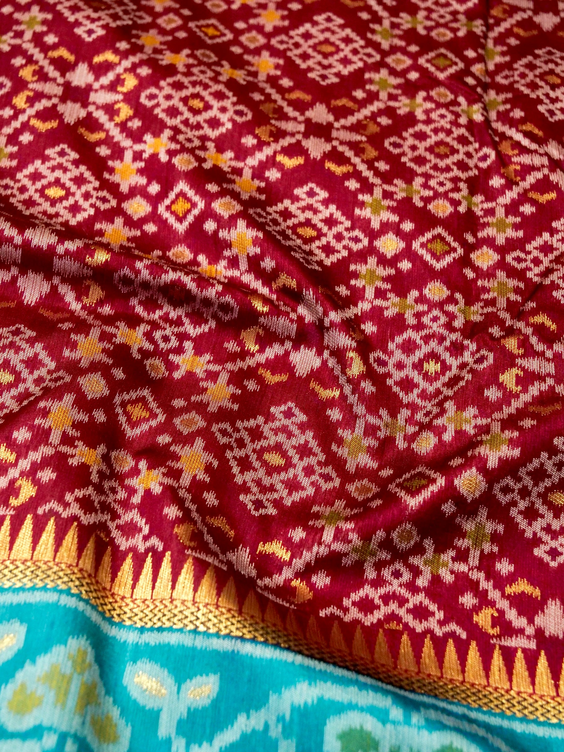 Maroon Wine Patola Silk Saree with Contrast Turquoise Blue Border