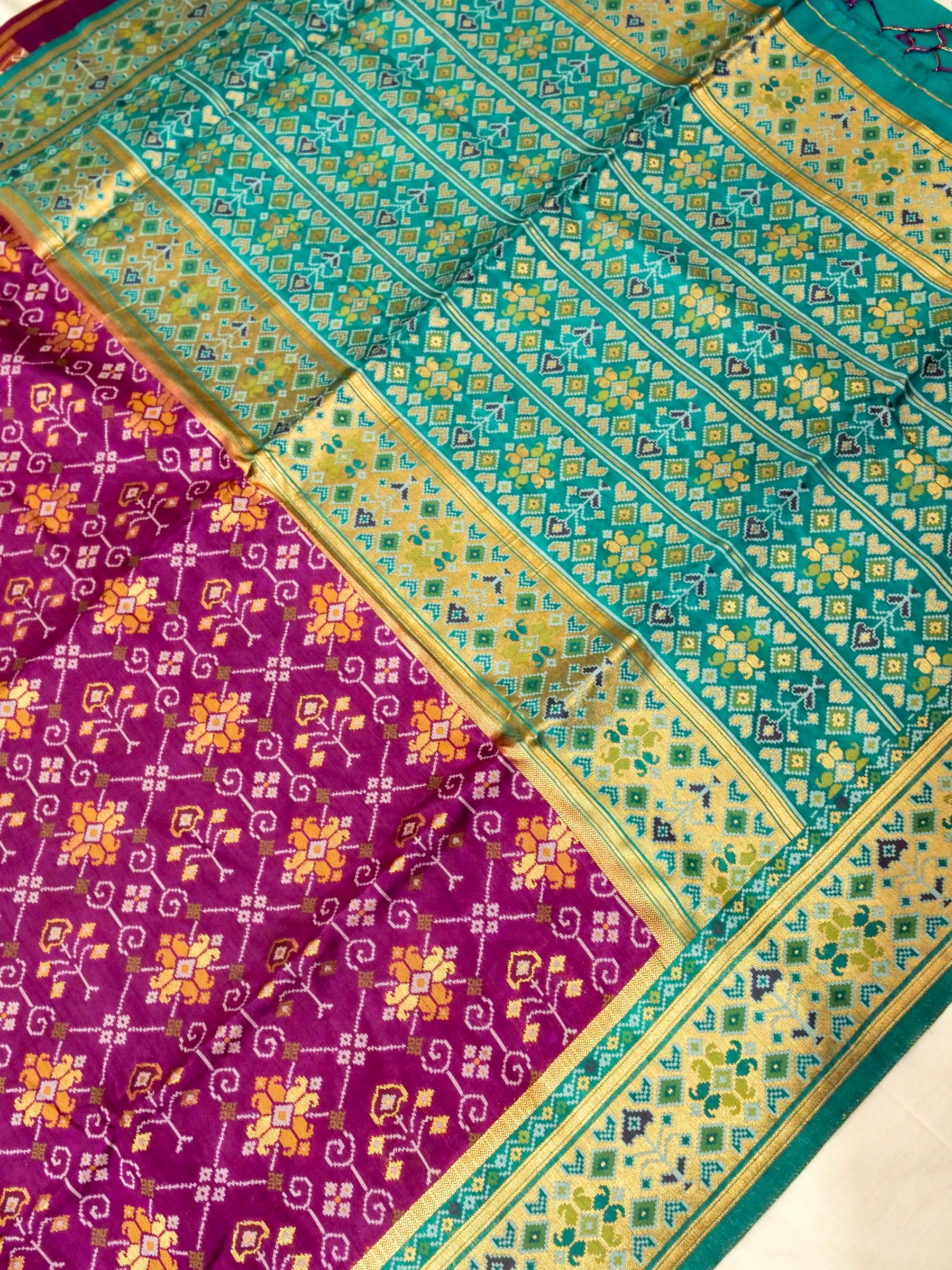 Magenta Purple Patola Silk Saree with Contrast Teal Green Border