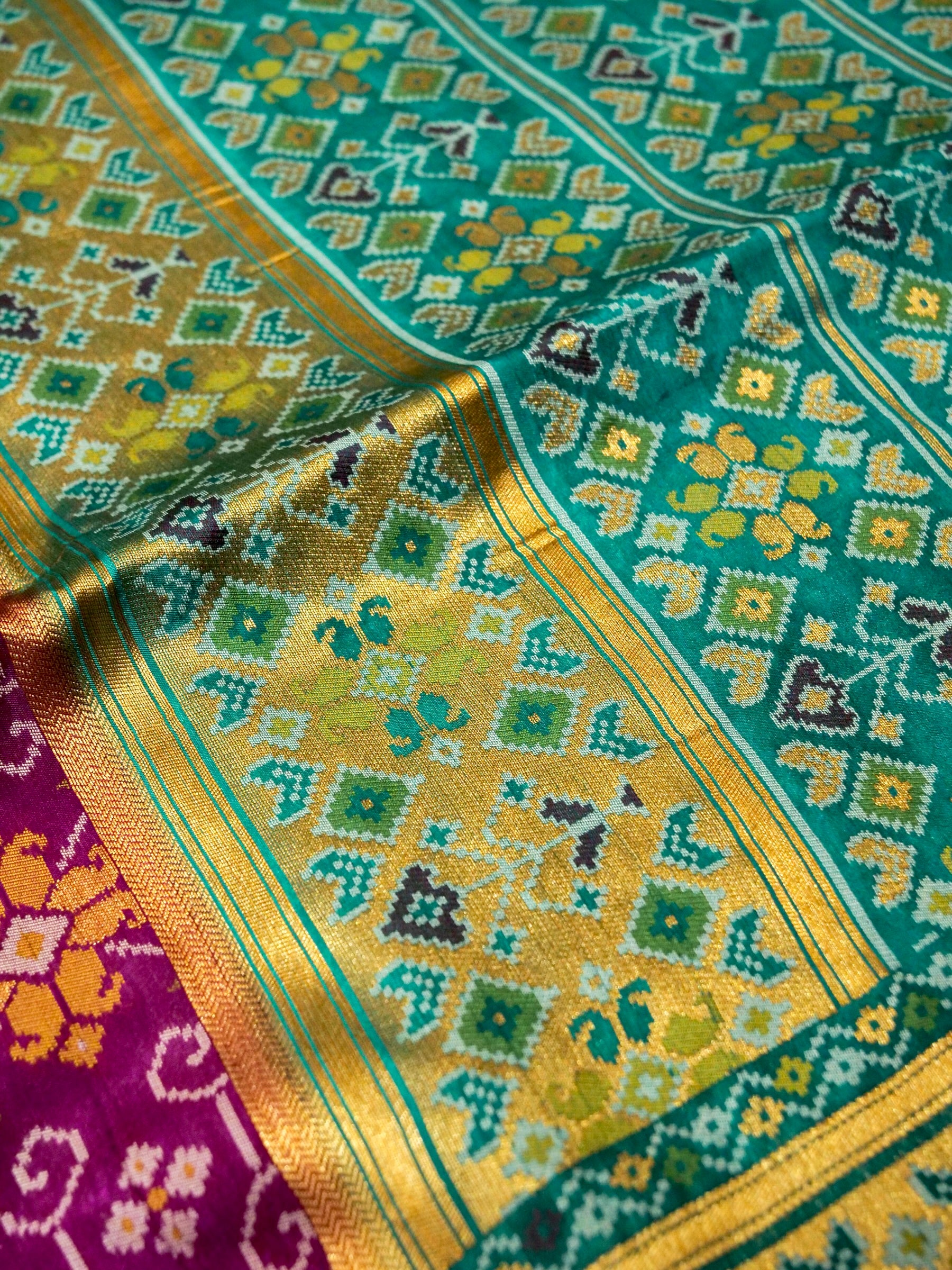 Magenta Purple Patola Silk Saree with Contrast Teal Green Border