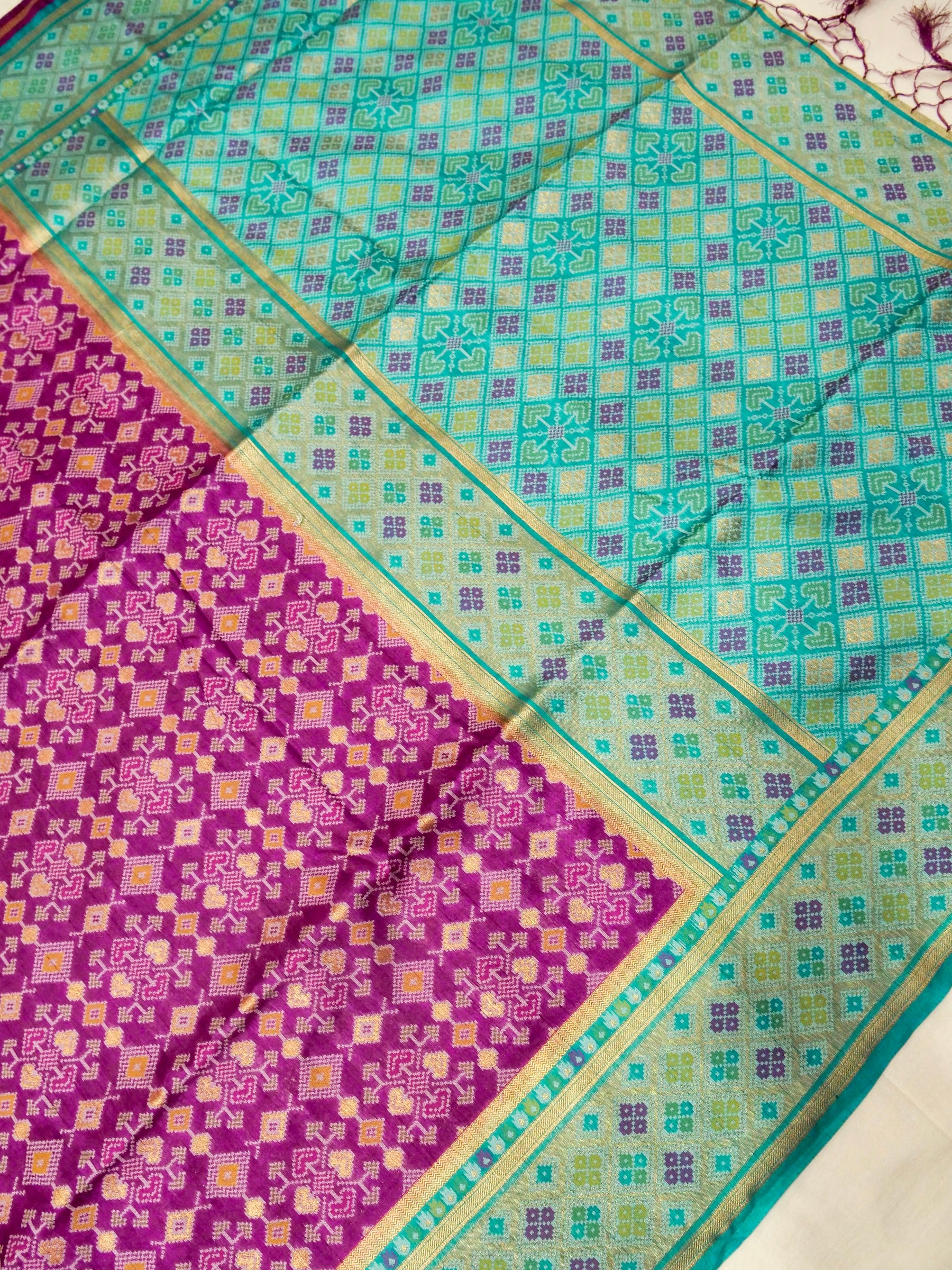 Orchid Purple Patola Silk Saree with Contrast Turquoise Blue Border