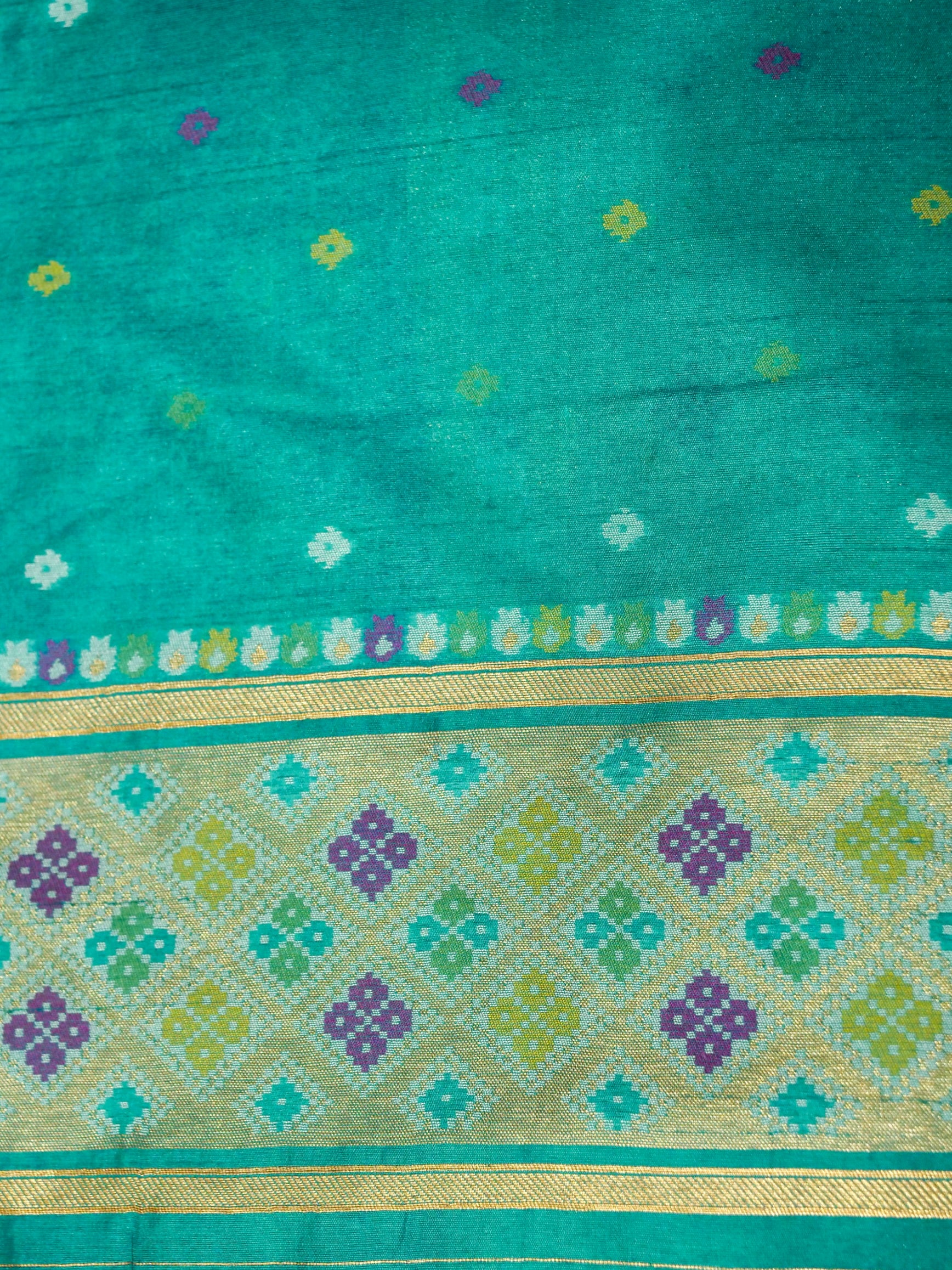 Orchid Purple Patola Silk Saree with Contrast Turquoise Blue Border