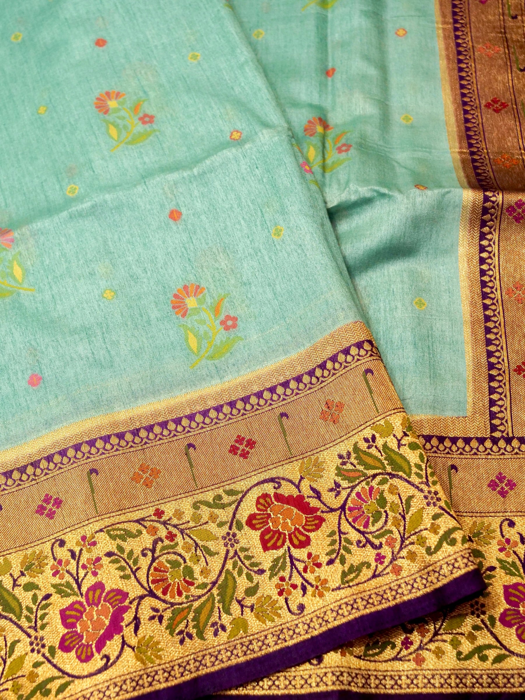 Mint Aqua Patola Silk Saree with Contrast Purple Floral Zari Border