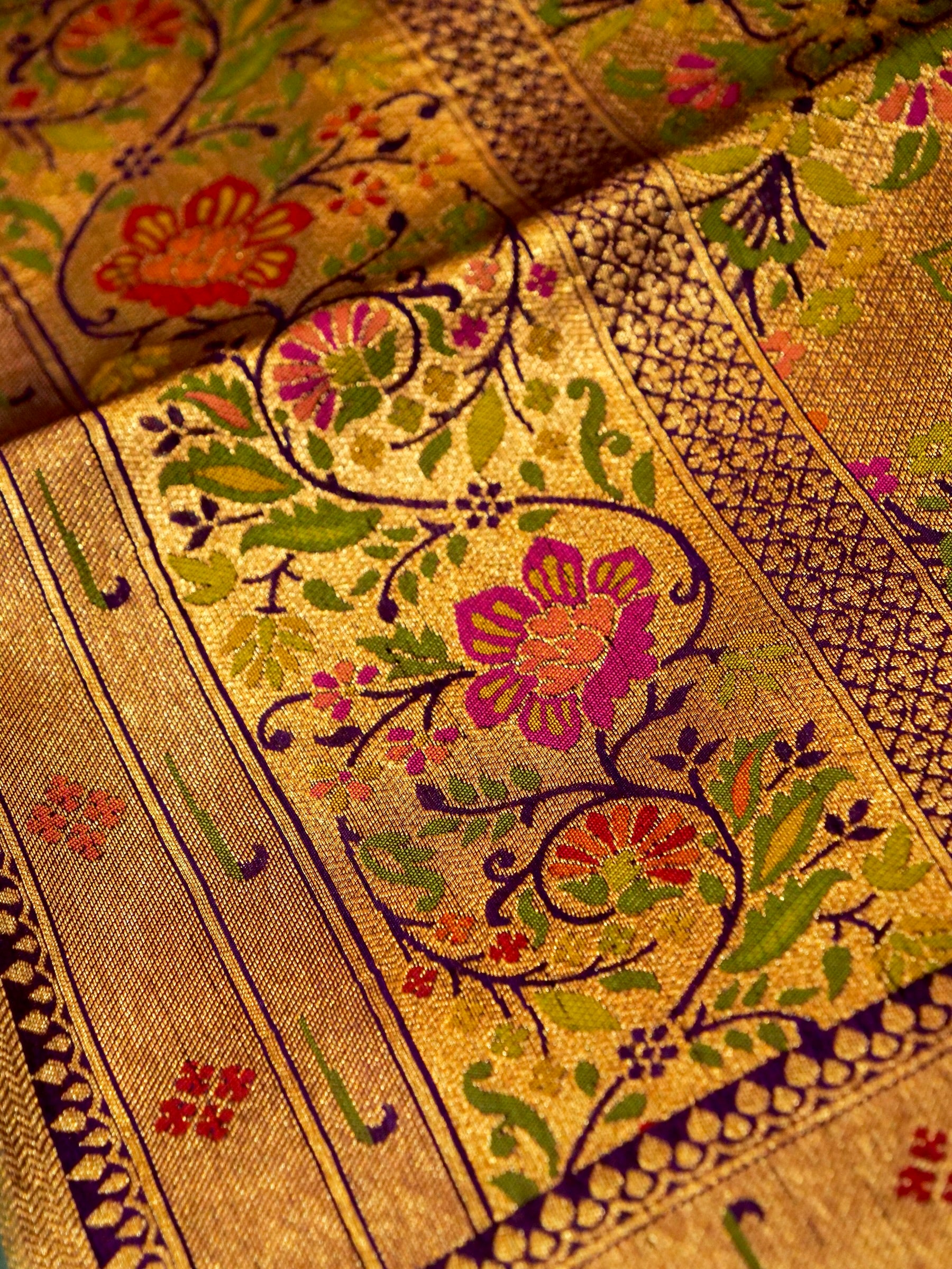 Mint Aqua Patola Silk Saree with Contrast Purple Floral Zari Border