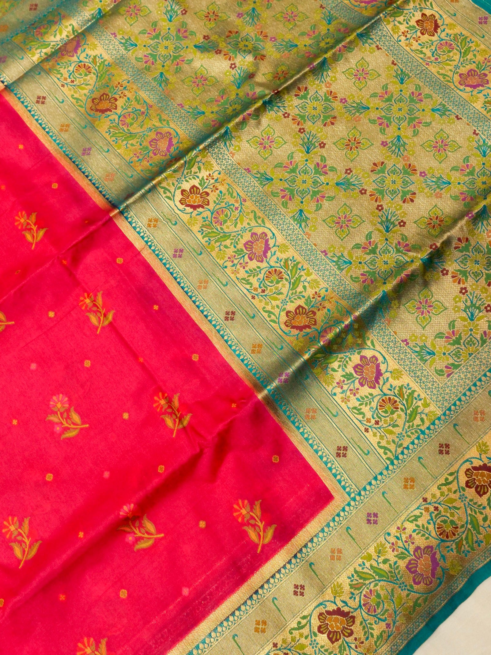 Rani Pink Patola Silk Saree with Contrast Teal Floral Zari Border
