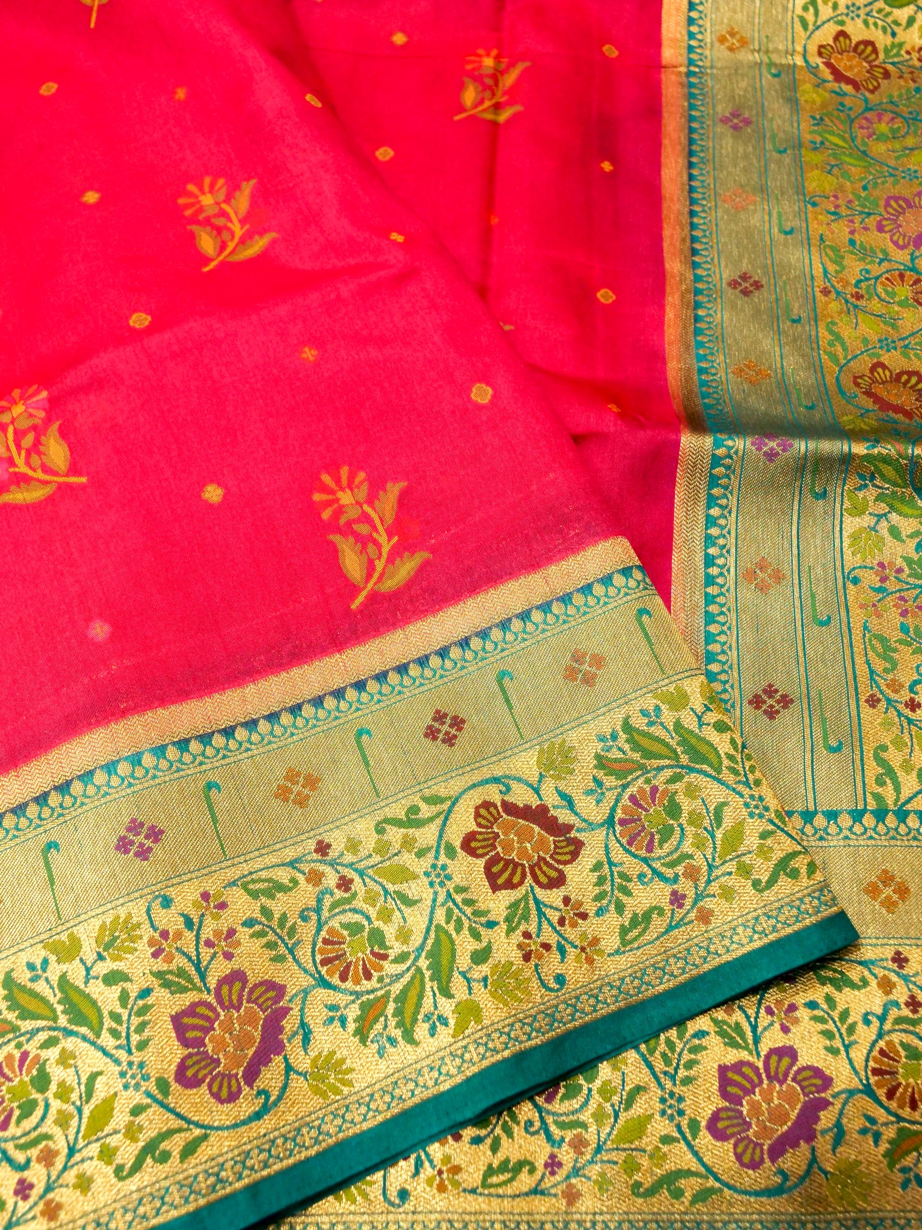 Rani Pink Patola Silk Saree with Contrast Teal Floral Zari Border