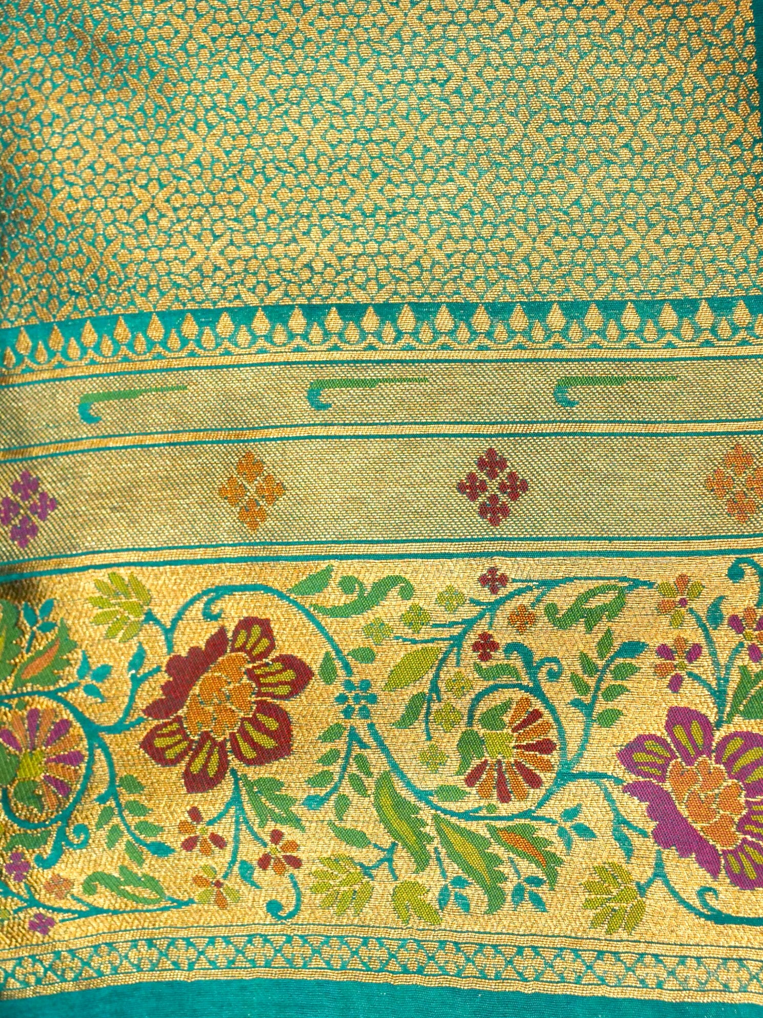 Rani Pink Patola Silk Saree with Contrast Teal Floral Zari Border