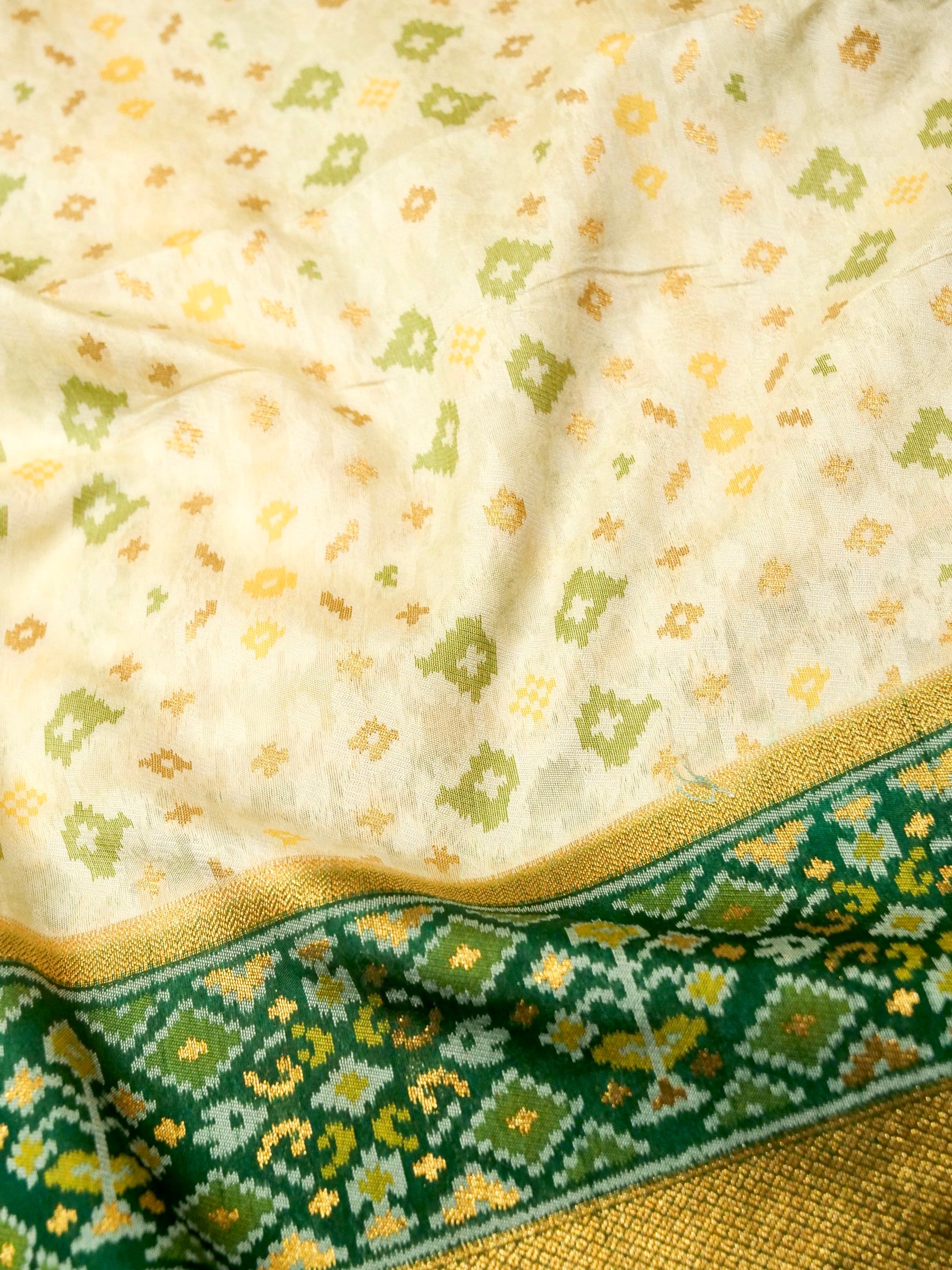 Soft Ivory Patola Silk Saree with Emerald Green Border