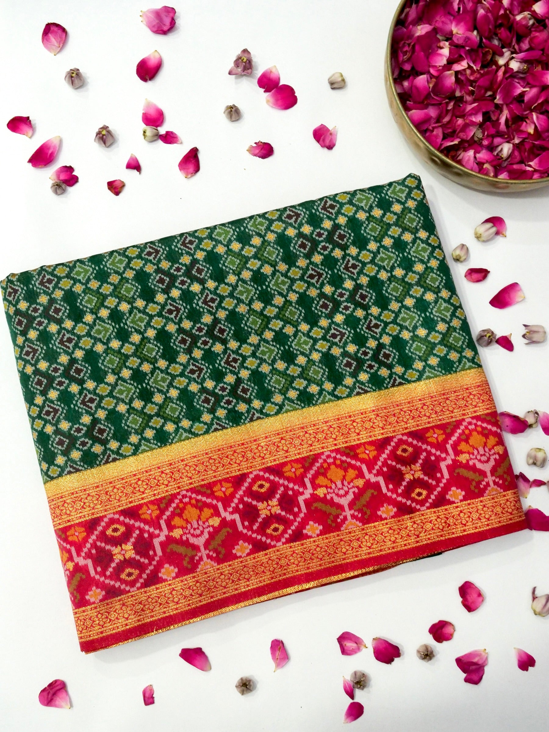 Emerald Green Patola Silk Saree with Contrast Rani Pink Border
