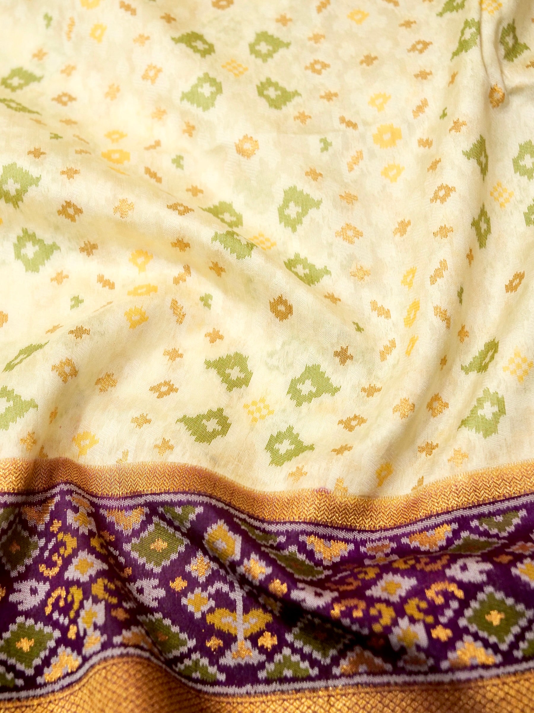 Soft Ivory Patola Silk Saree with Royal Purple Border