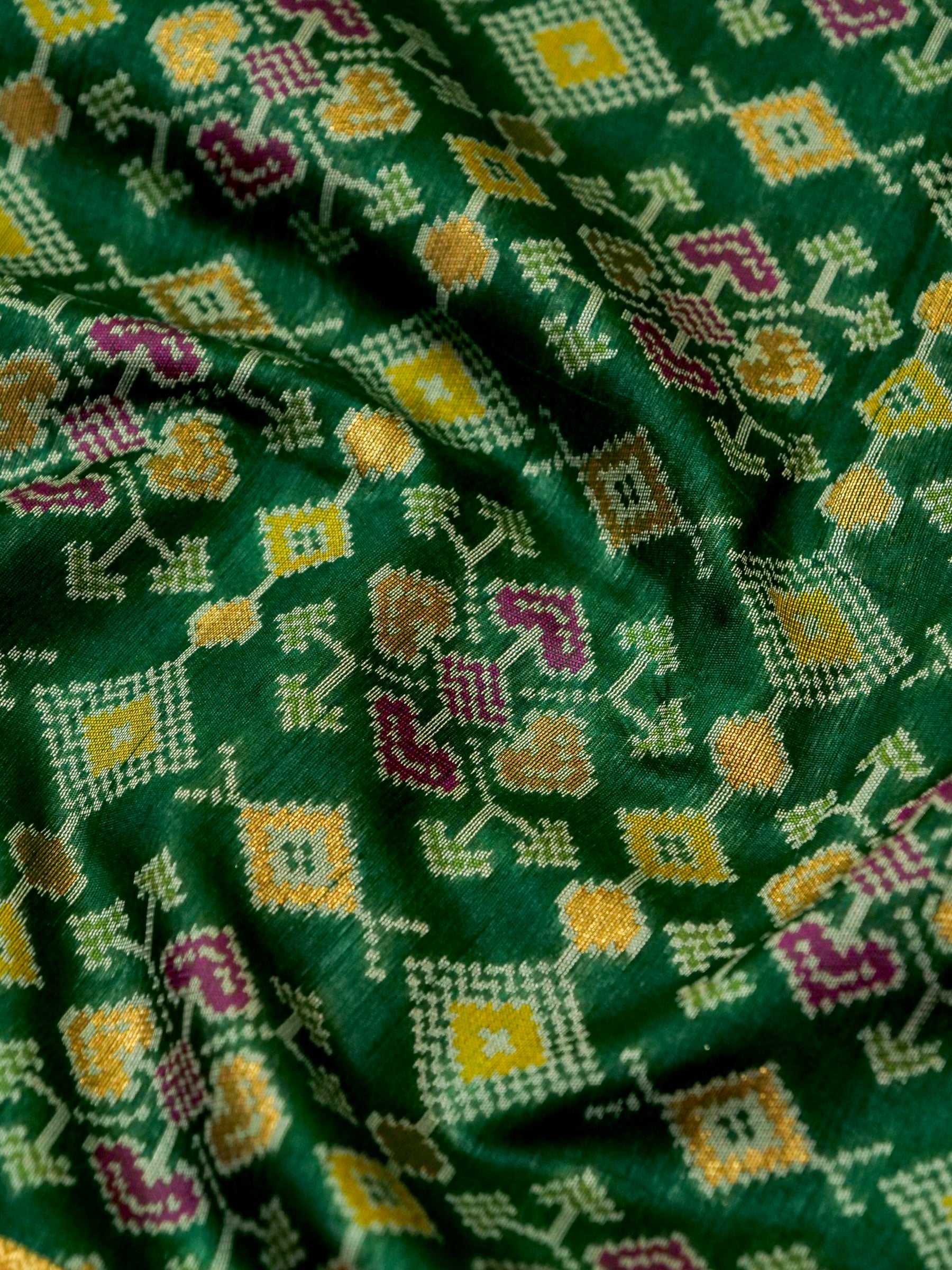 Emerald Green Patola Silk Saree with Contrast Peach Pink Border