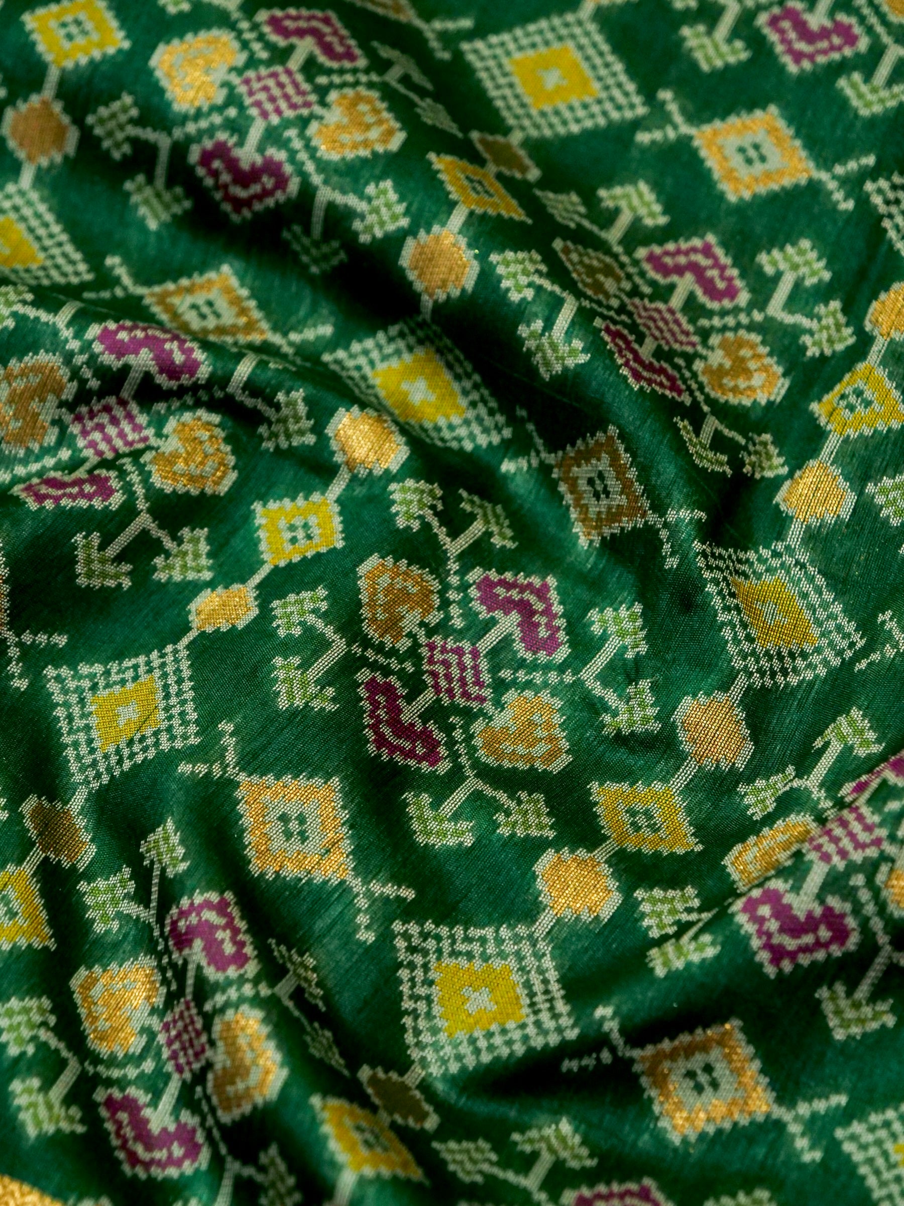 Emerald Green Patola Silk Saree with Contrast Peach Pink Border
