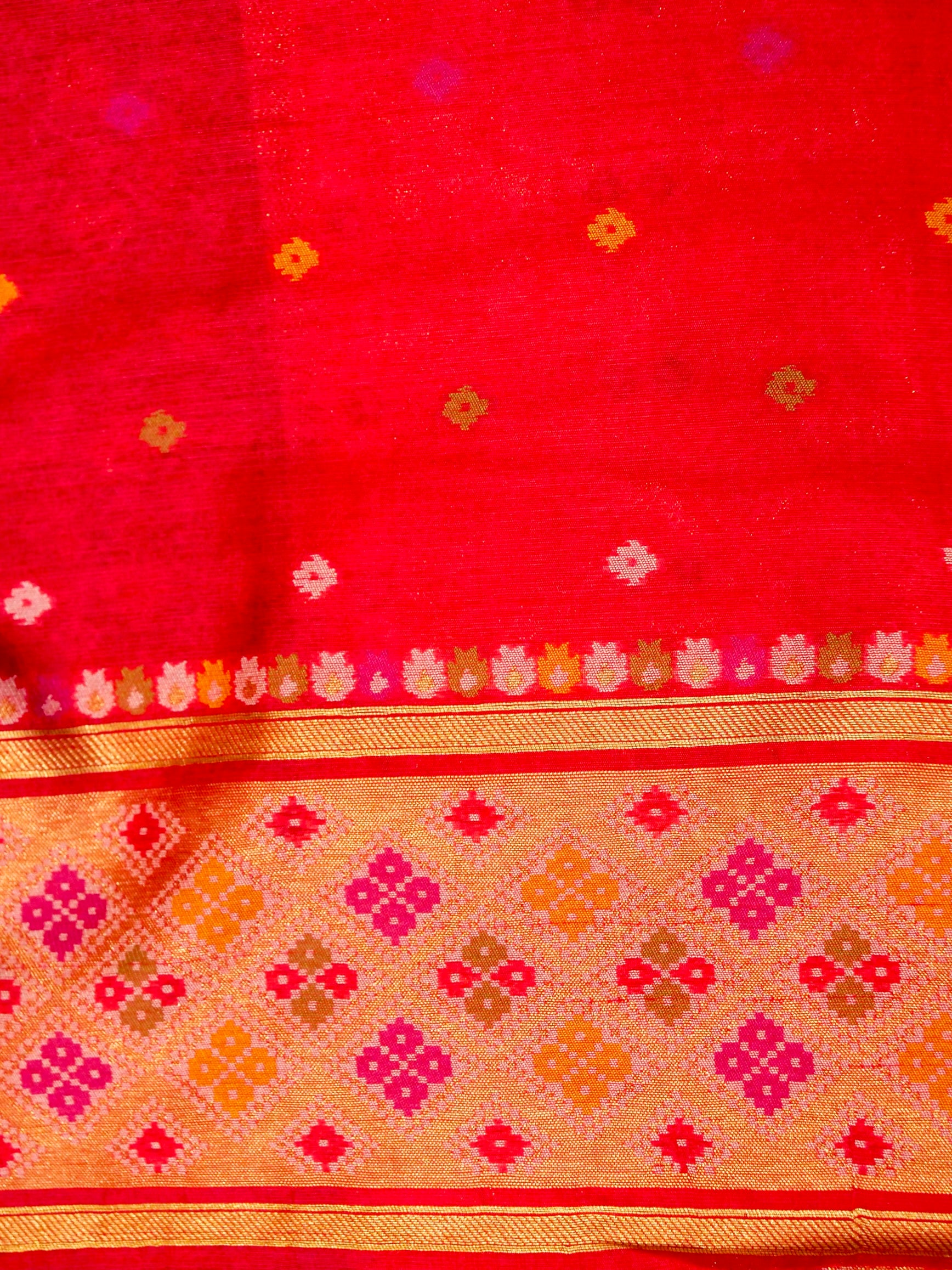 Emerald Green Patola Silk Saree with Contrast Peach Pink Border