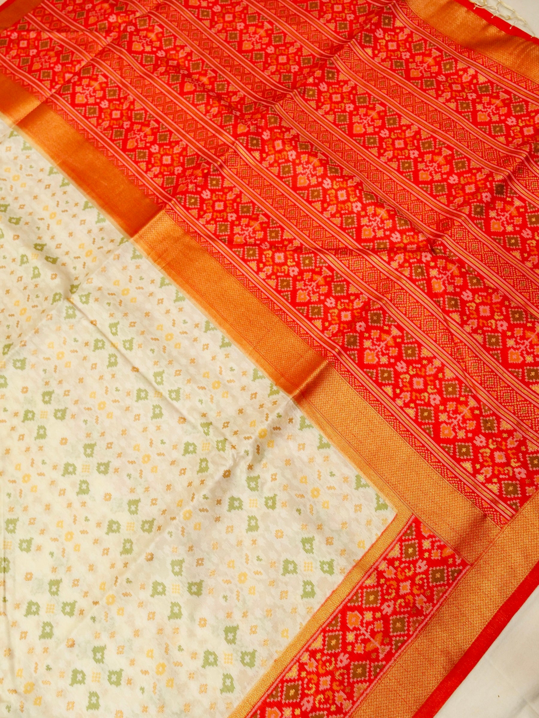 Soft Ivory Patola Silk Saree with Coral Red Border