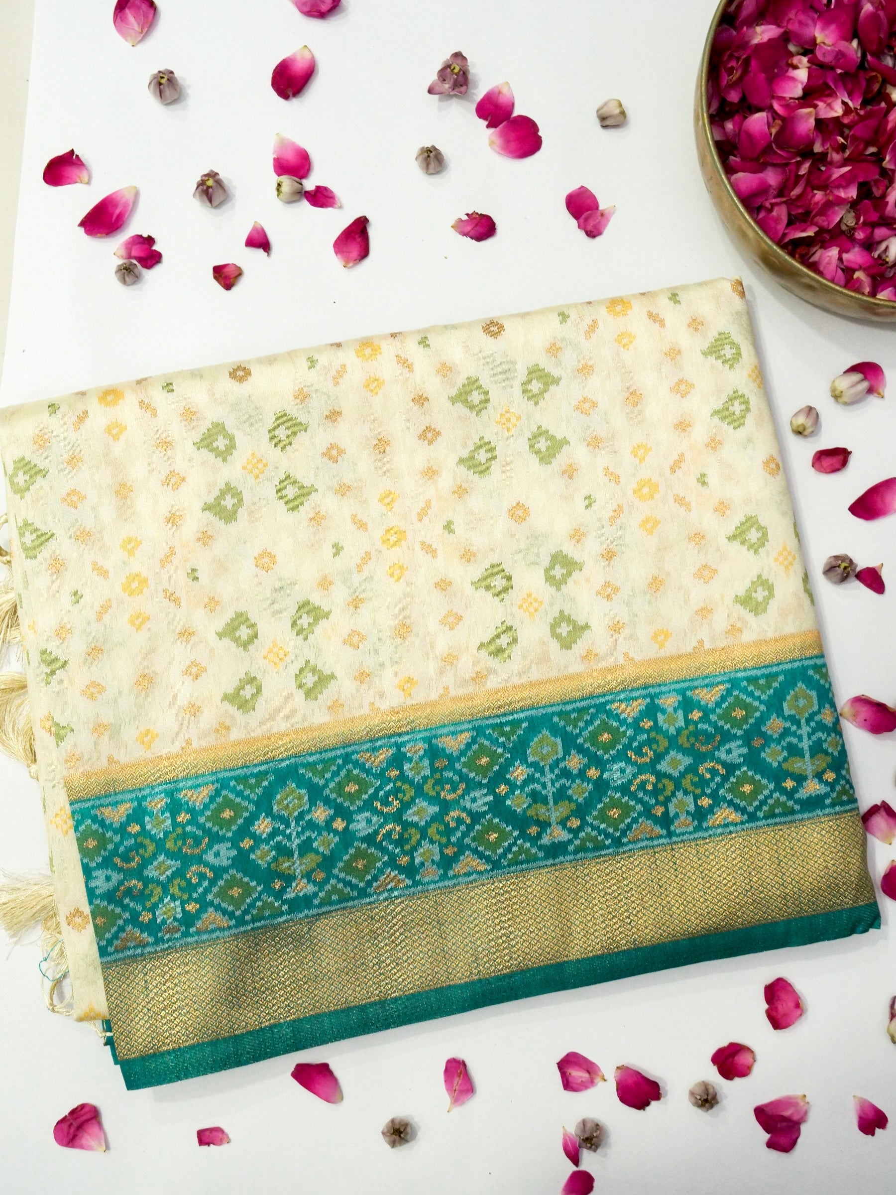 Soft Ivory Patola Silk Saree with Turquoise Green Border