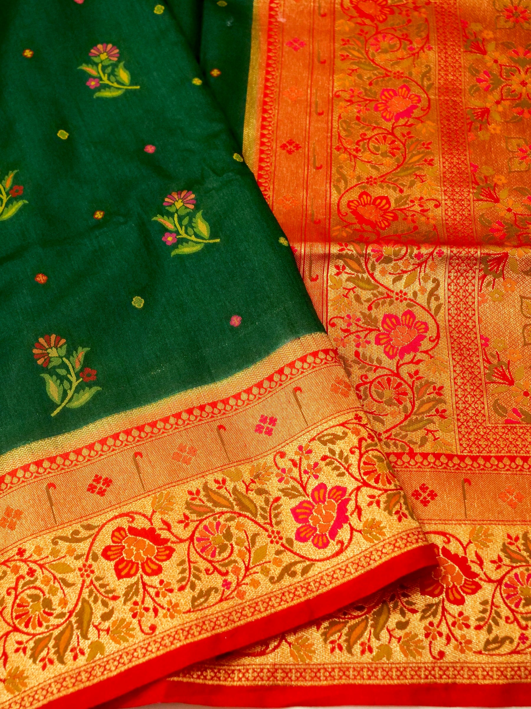 Bottle Green Patola Silk Saree with Contrast Coral Floral Zari Border