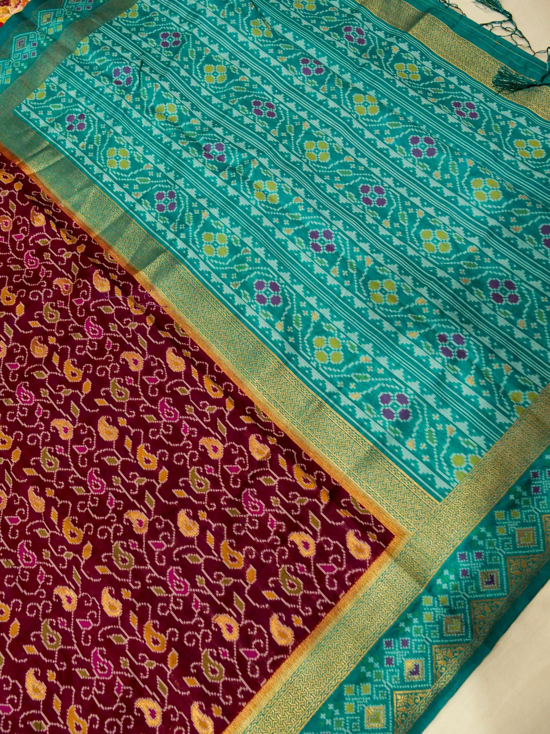 Wine Patola Silk Saree with Contrast Turquoise Border