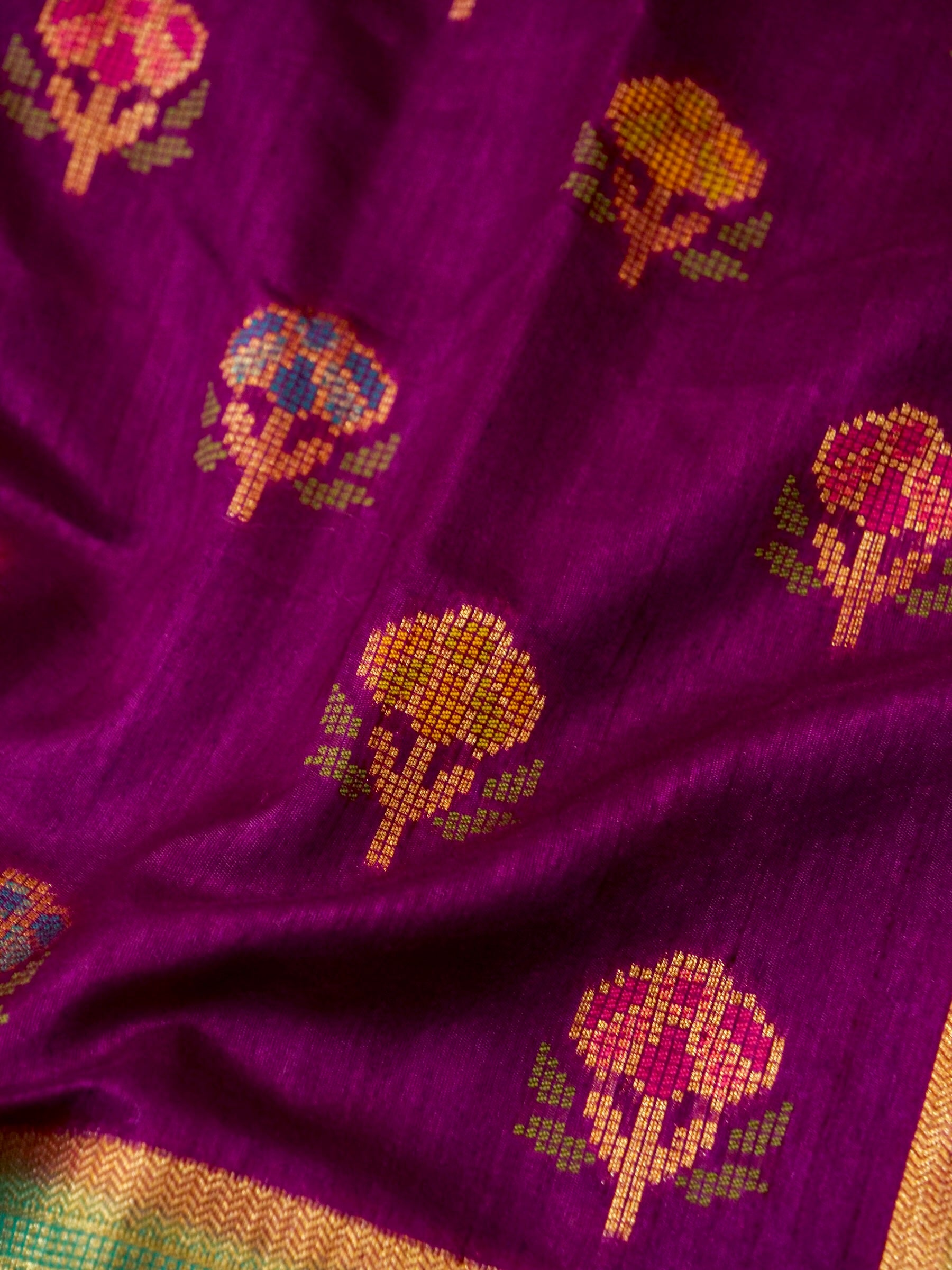 Magenta Patola Silk Saree with Contrast Peacock Green Floral Zari Border