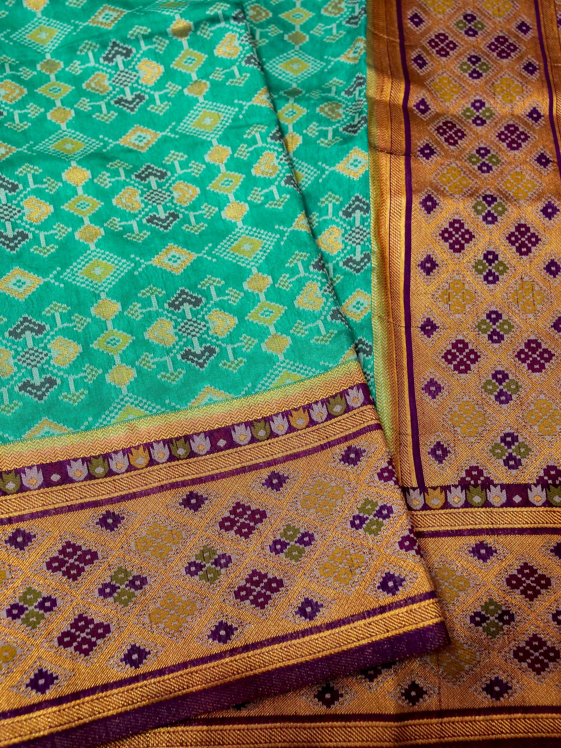 Turquoise Patola Silk Saree with Contrast Violet Border