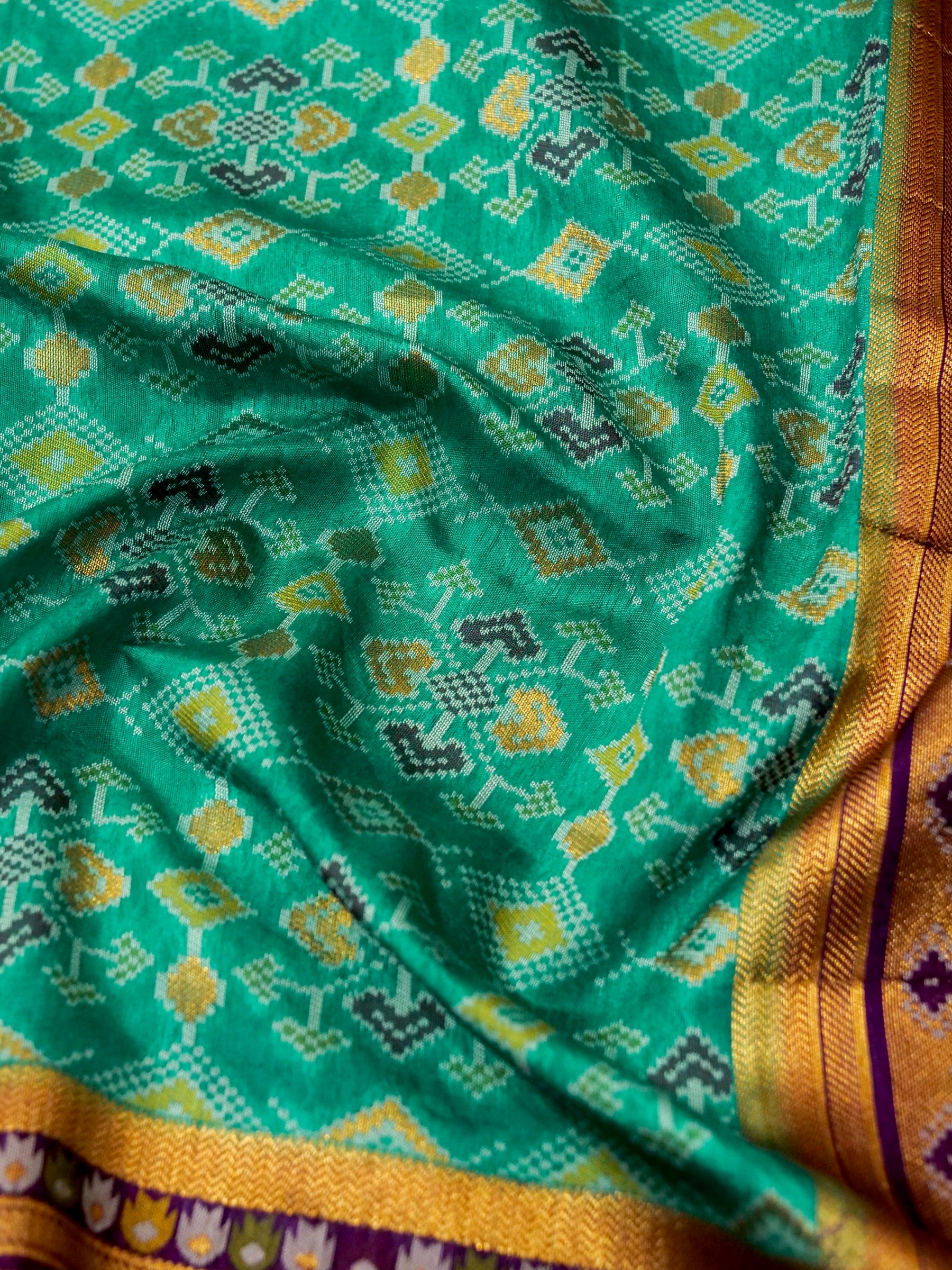 Turquoise Patola Silk Saree with Contrast Violet Border