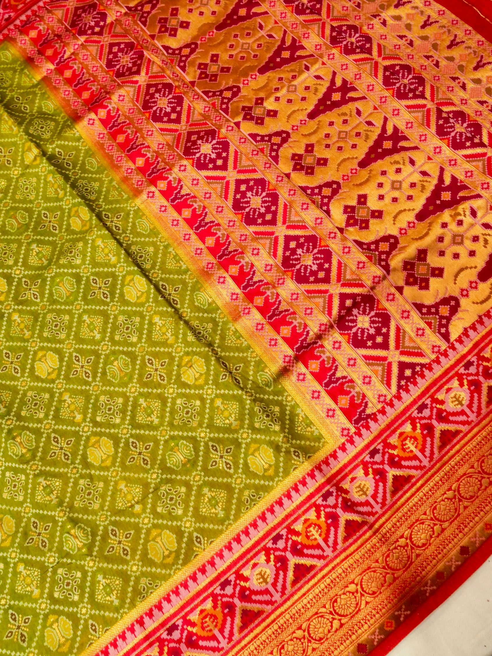 Olive Green Patola Silk Saree with Contrast Rani Pink Border