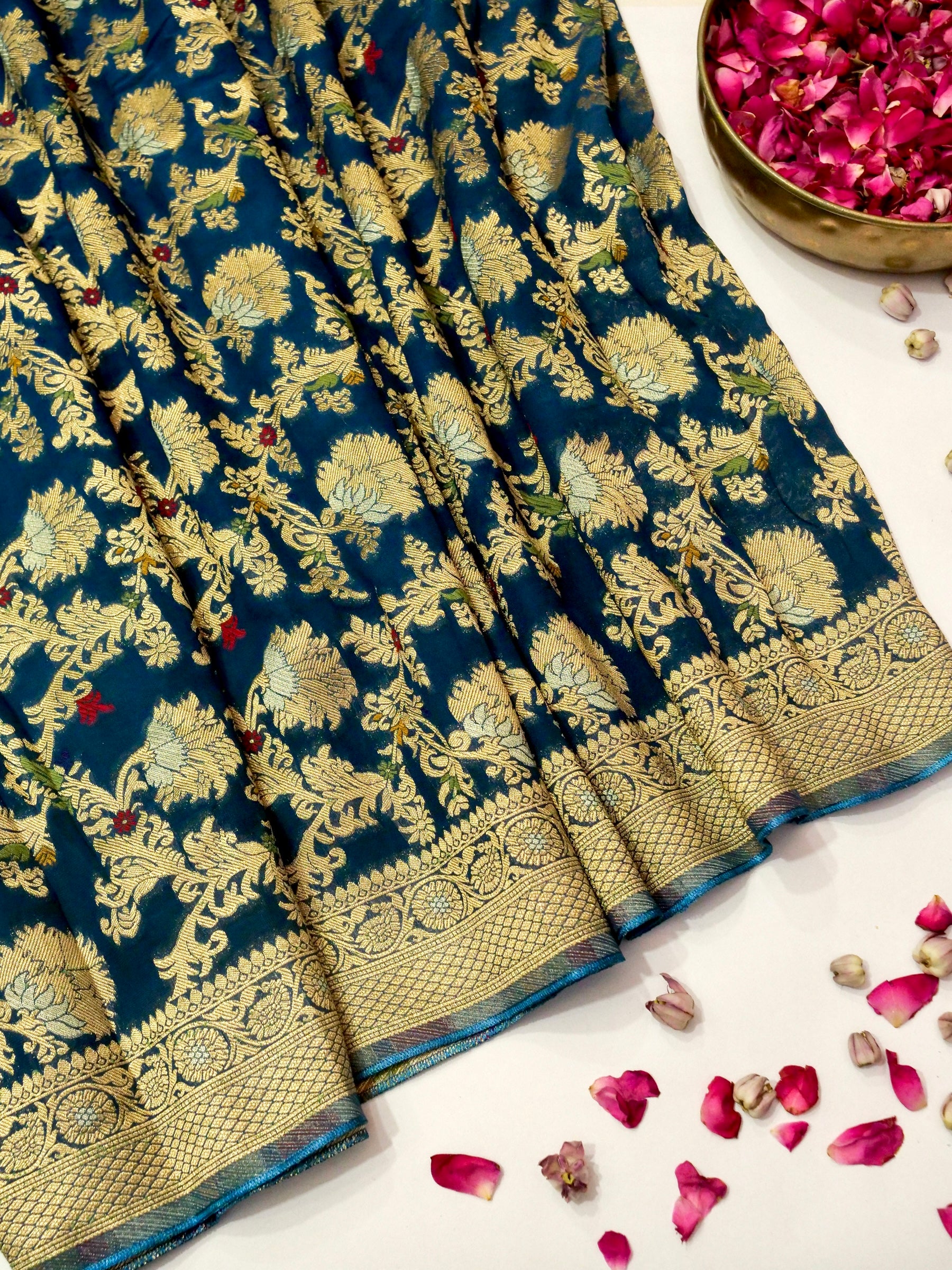 Peacock Blue Crepe Georgette Silk Saree with Gold Border