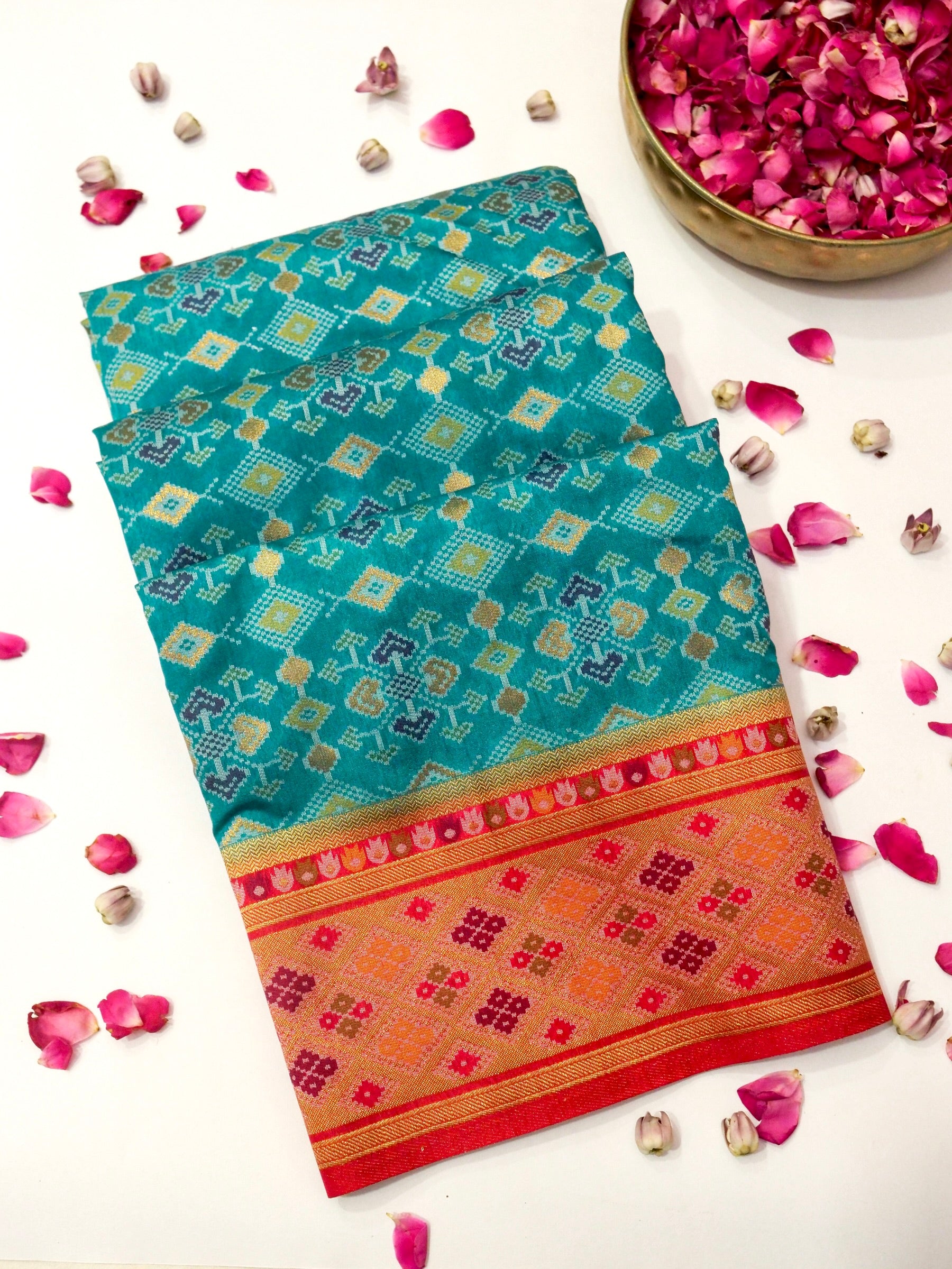 Turquoise Patola Silk Saree with Contrast Peach Pink Border