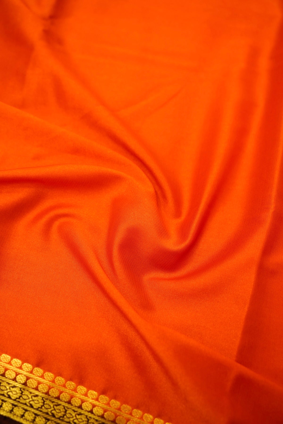 Maithili - Orange Mysore Crepe Silk Saree with Dark Brown Border