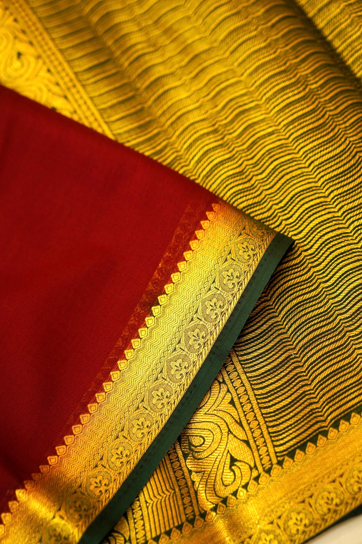 Maithili - Dark Brown Mysore Crepe Silk Saree with Green Border