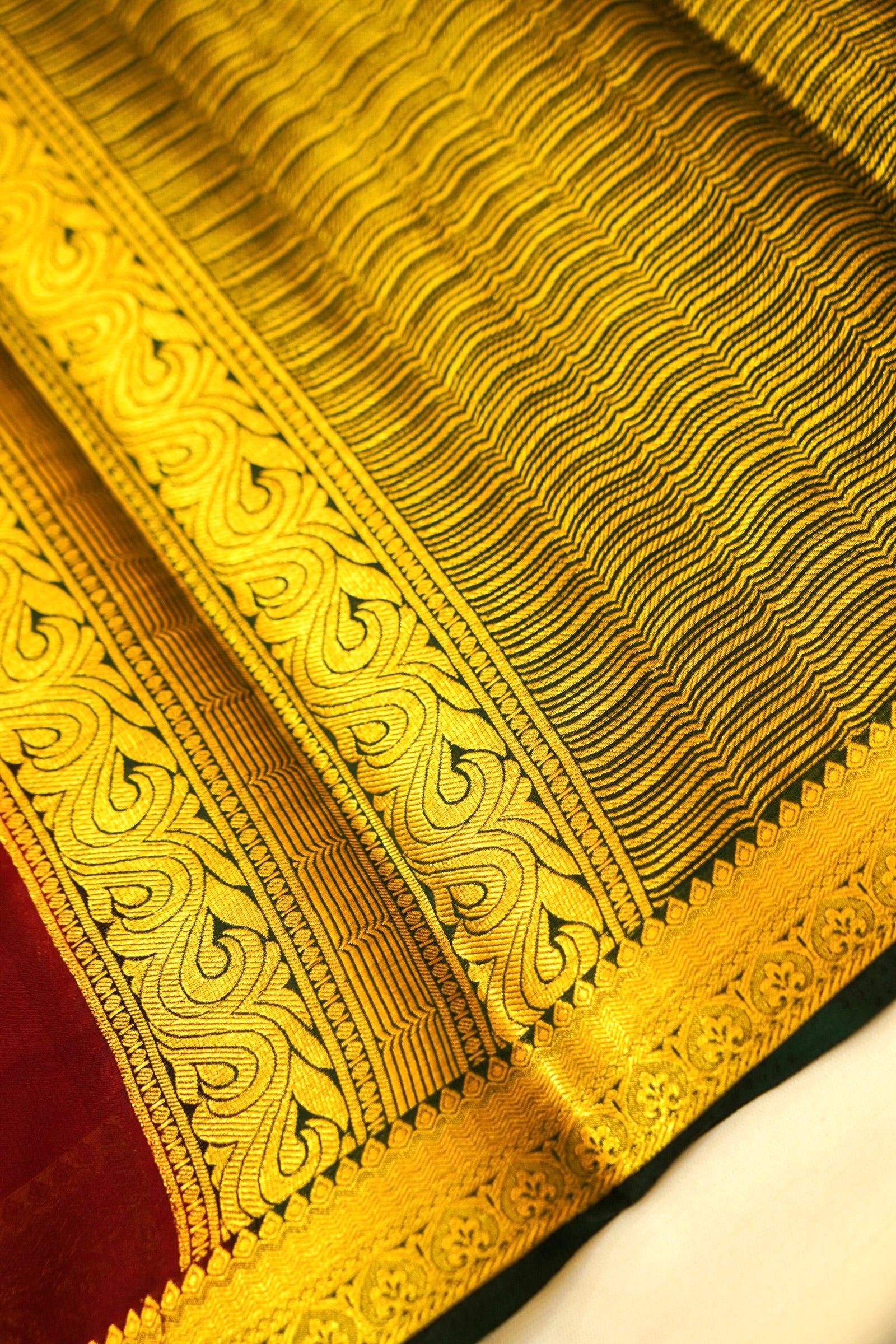 Maithili - Dark Brown Mysore Crepe Silk Saree with Green Border
