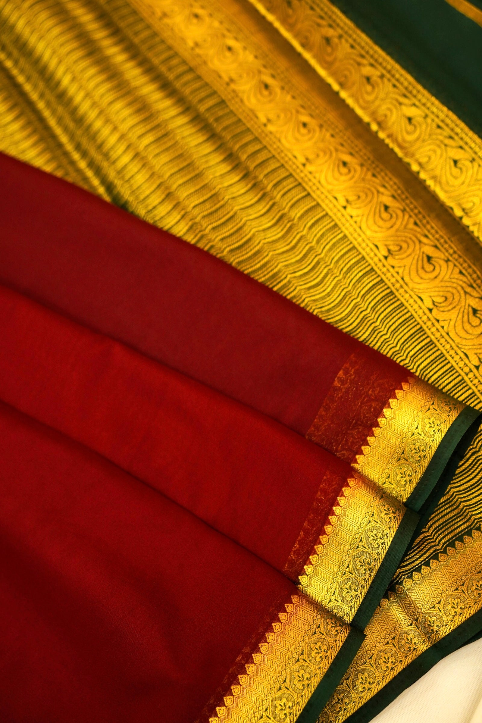 Maithili - Dark Brown Mysore Crepe Silk Saree with Green Border