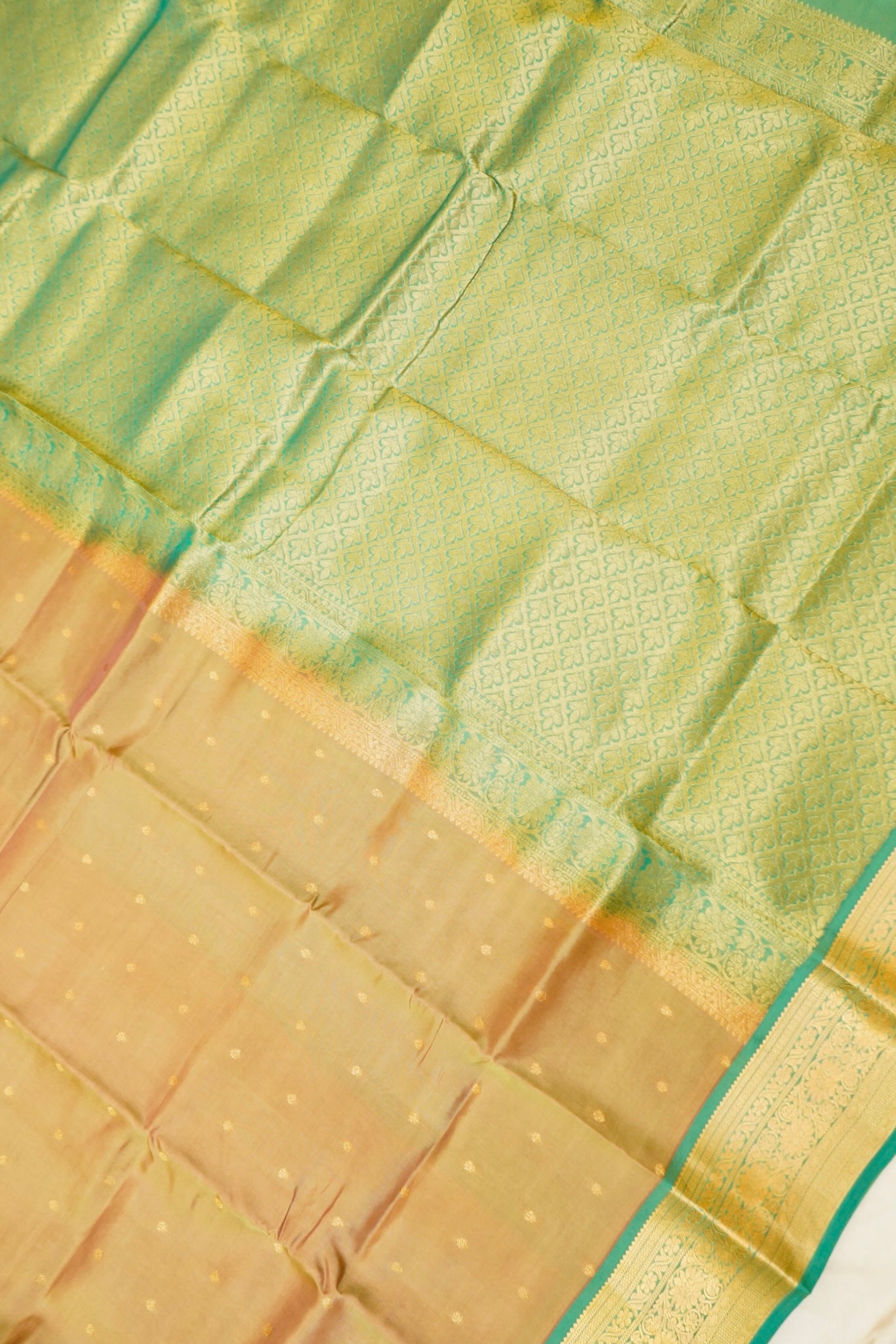 Maithili - Beige Pure Kanjipuram Silk Saree with Teal Green Border