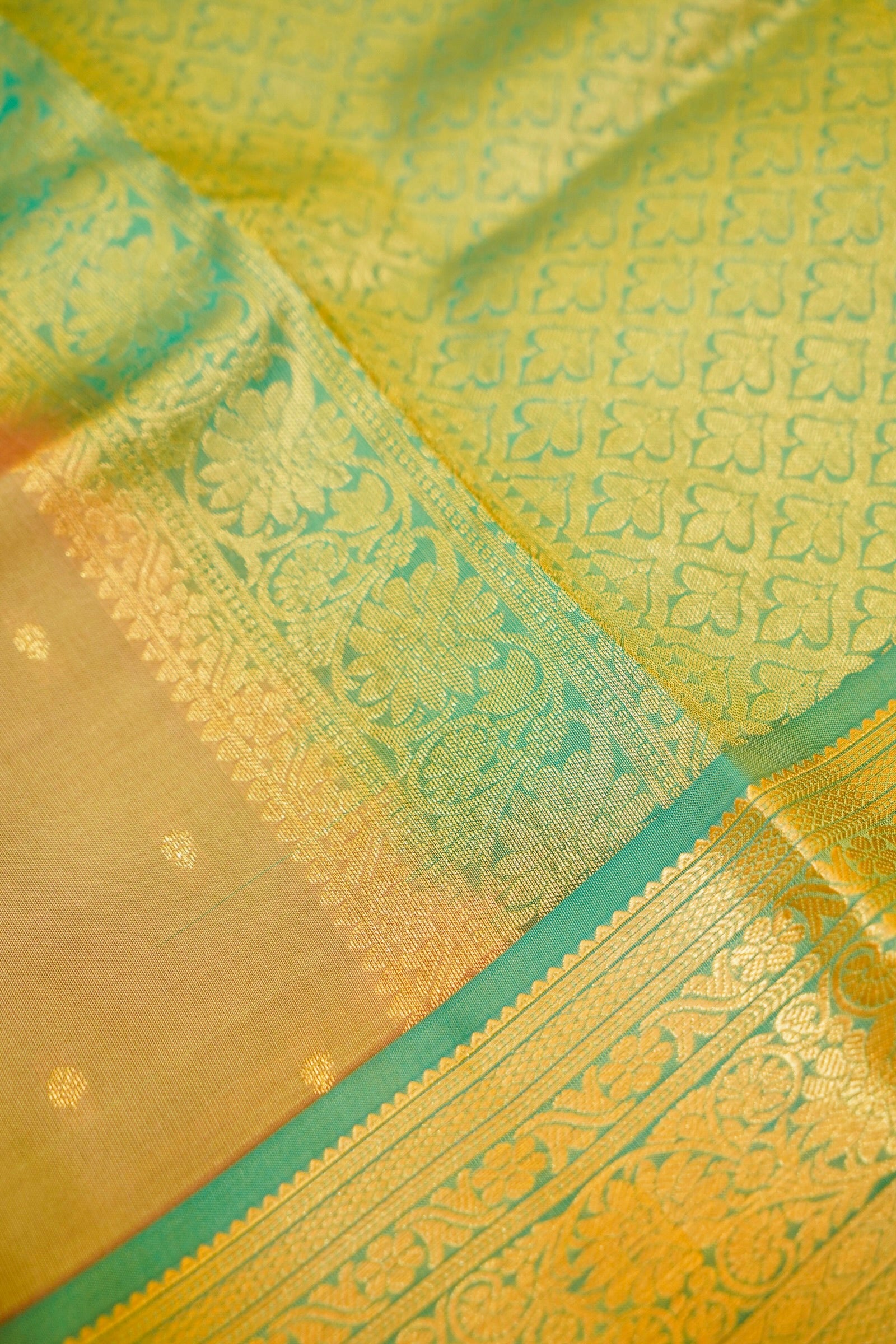 Maithili - Beige Pure Kanjipuram Silk Saree with Teal Green Border