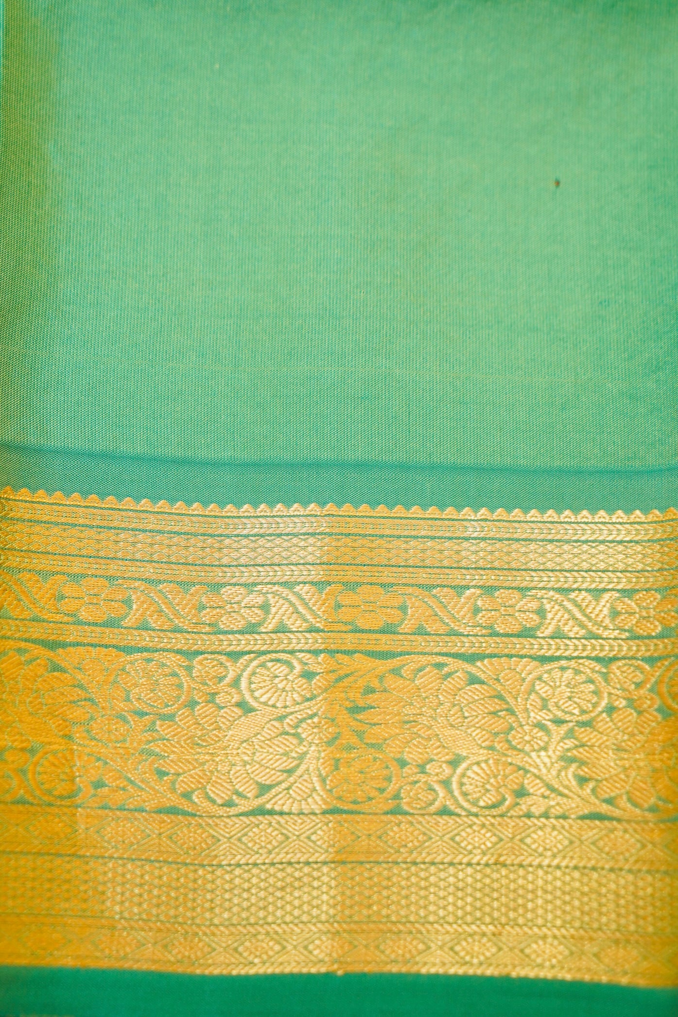 Maithili - Beige Pure Kanjipuram Silk Saree with Teal Green Border