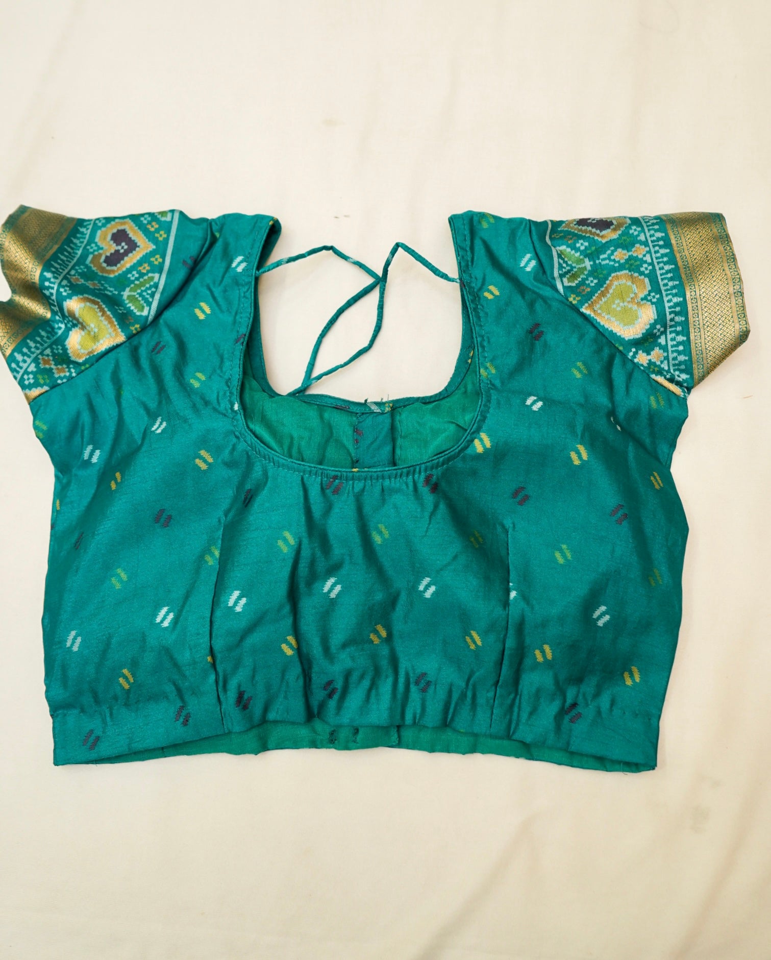 Ivory Ikkat Patola Silk Saree with Teal Border and Stitched Blouse