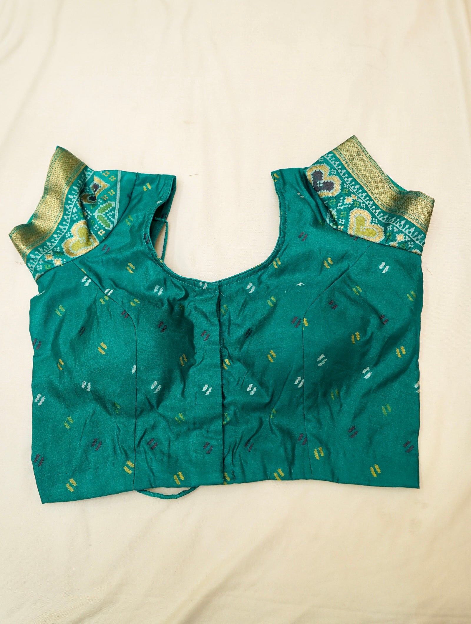 Mustard Yellow Ikkat Patola Silk Saree with Teal Border and Stitched Blouse