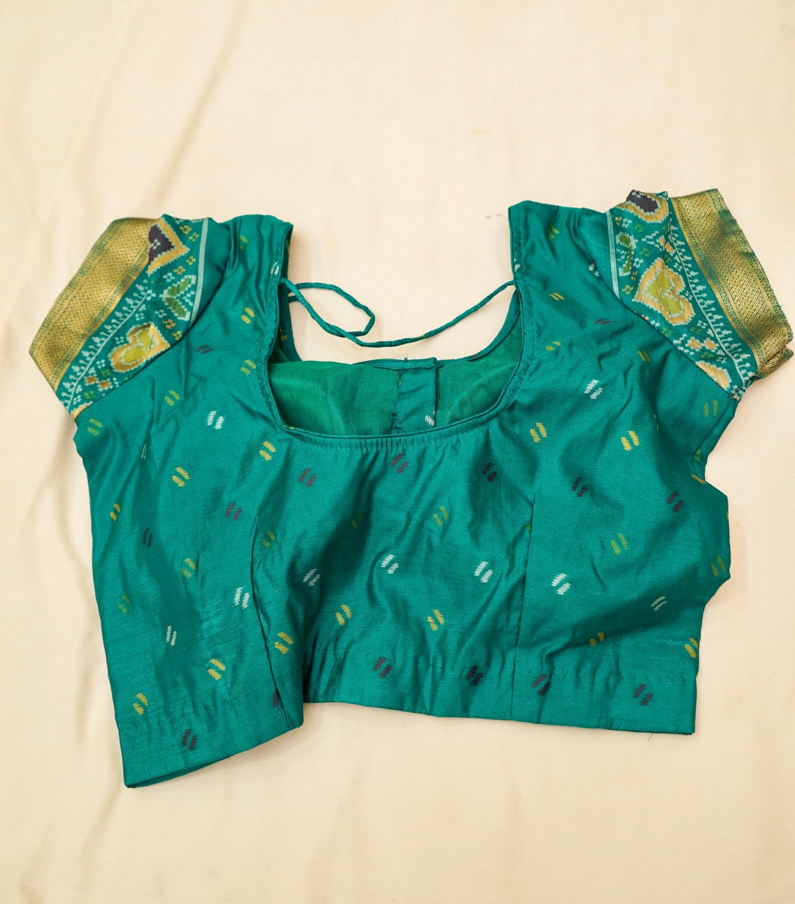 Bright Red Ikkat Patola Silk Saree with Teal Border and Stitched Blouse