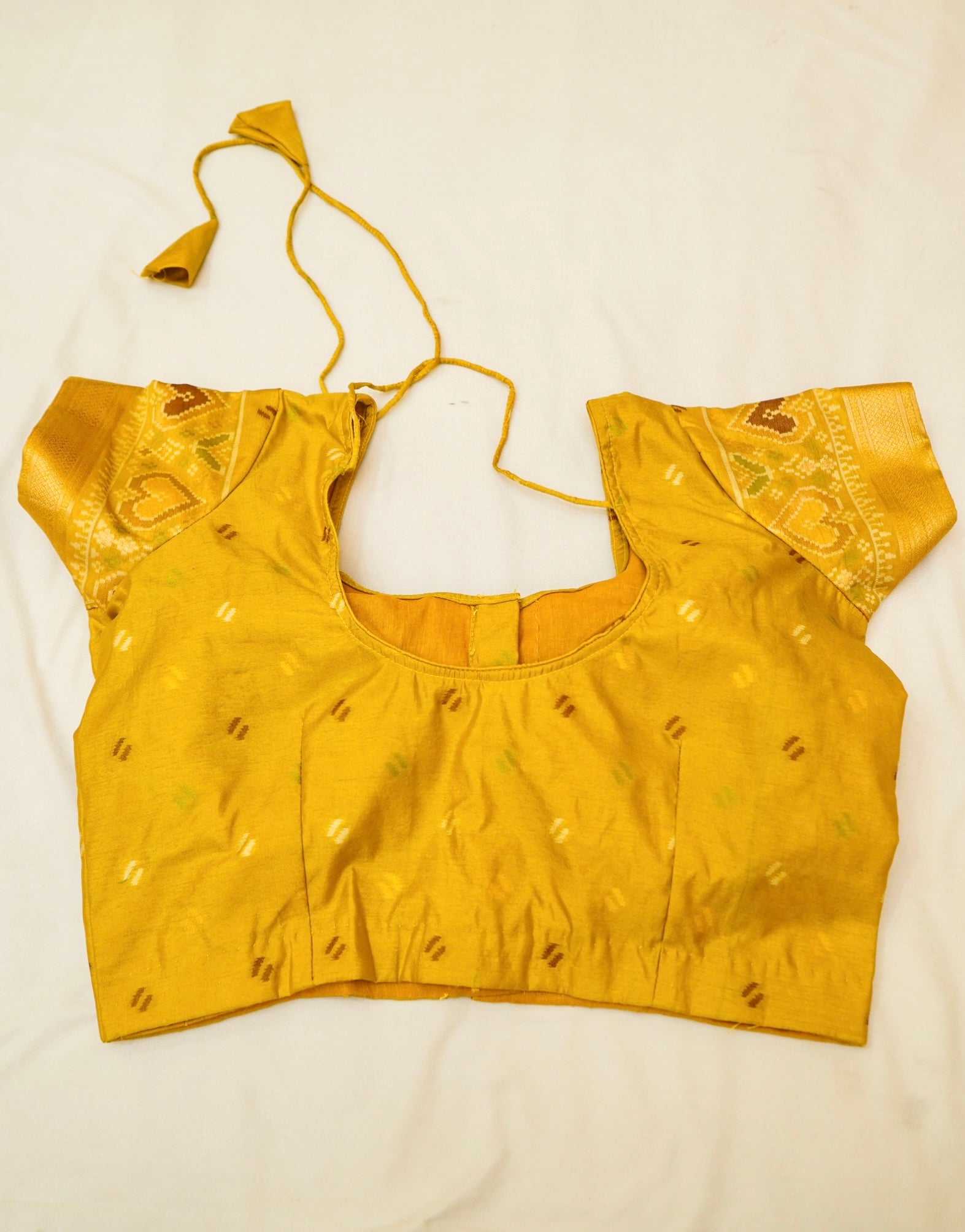 Deep Plum Ikkat Patola Silk Saree with Mustard Border and Stitched Blouse
