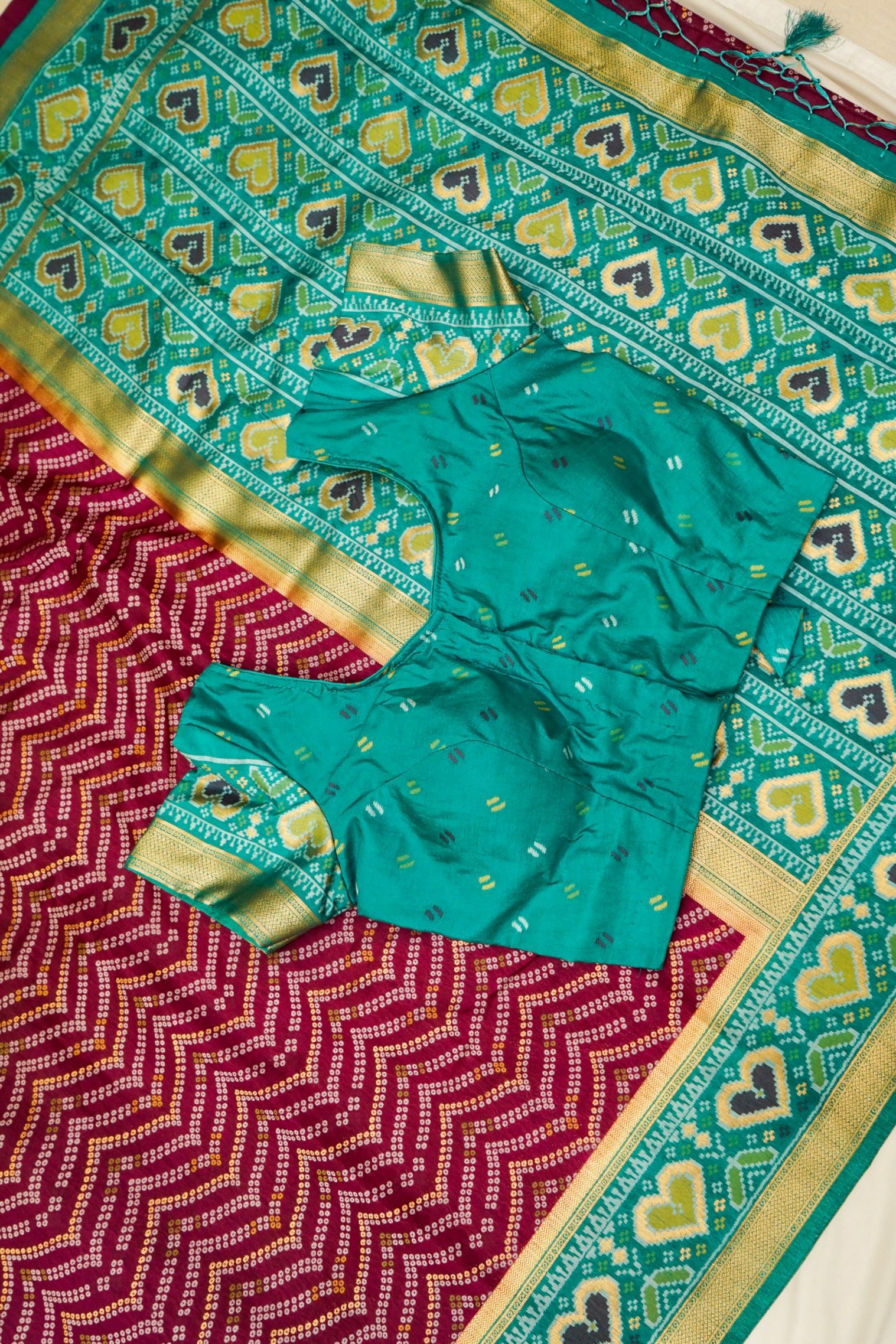 Wine Ikkat Patola Silk Saree with Teal Border and Stitched Blouse
