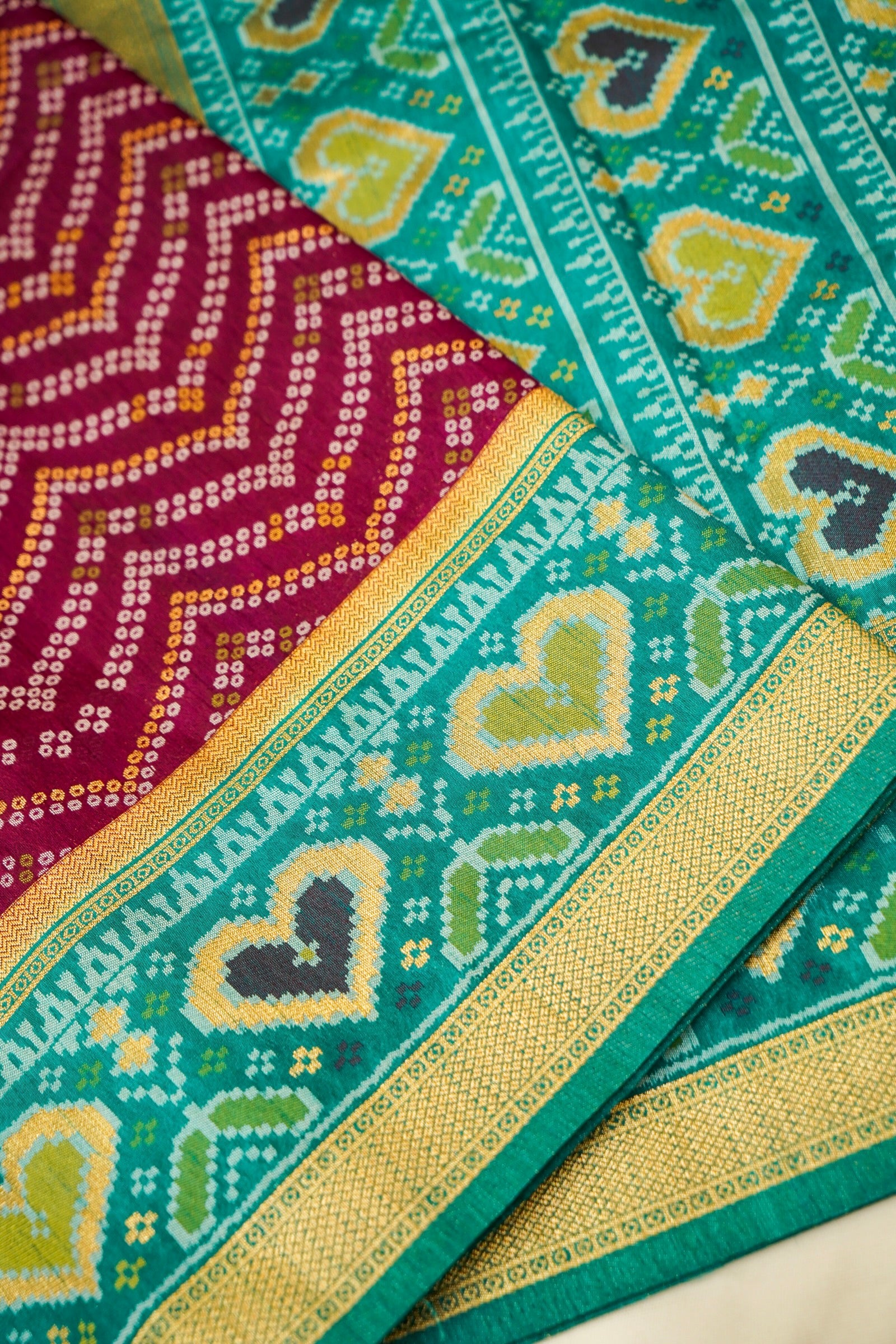 Wine Ikkat Patola Silk Saree with Teal Border and Stitched Blouse
