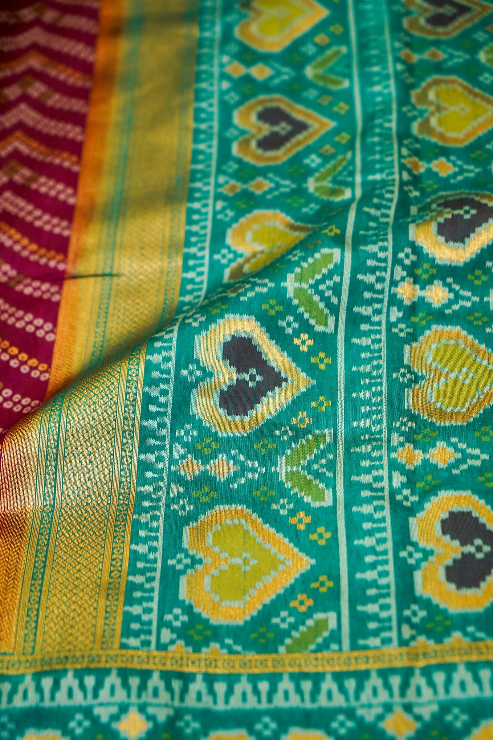 Wine Ikkat Patola Silk Saree with Teal Border and Stitched Blouse