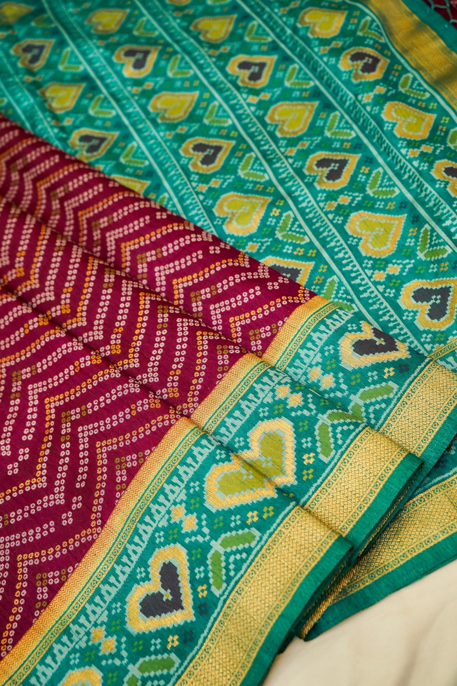 Wine Ikkat Patola Silk Saree with Teal Border and Stitched Blouse